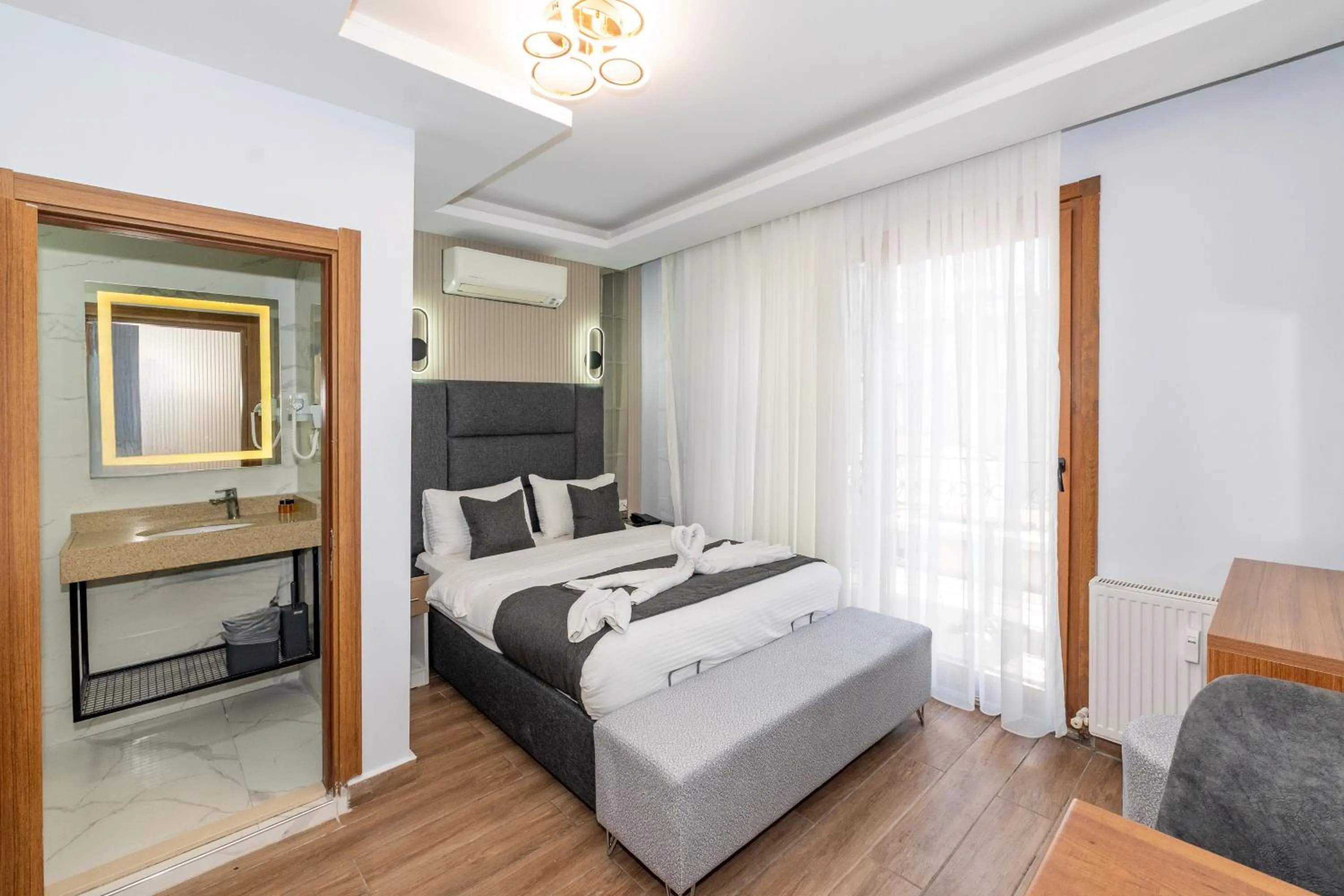 Bed in T-Square Residence