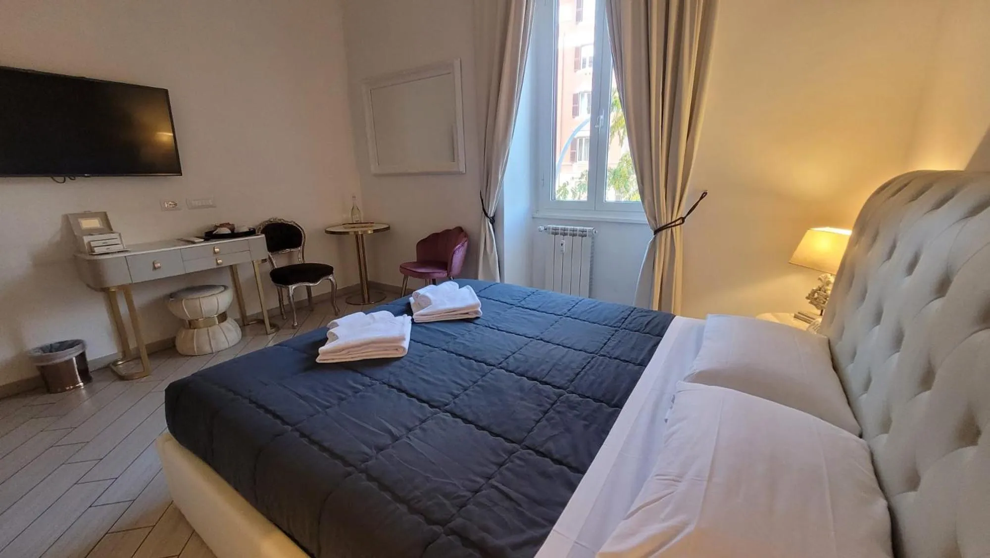 Bed in Rome Central Rooms