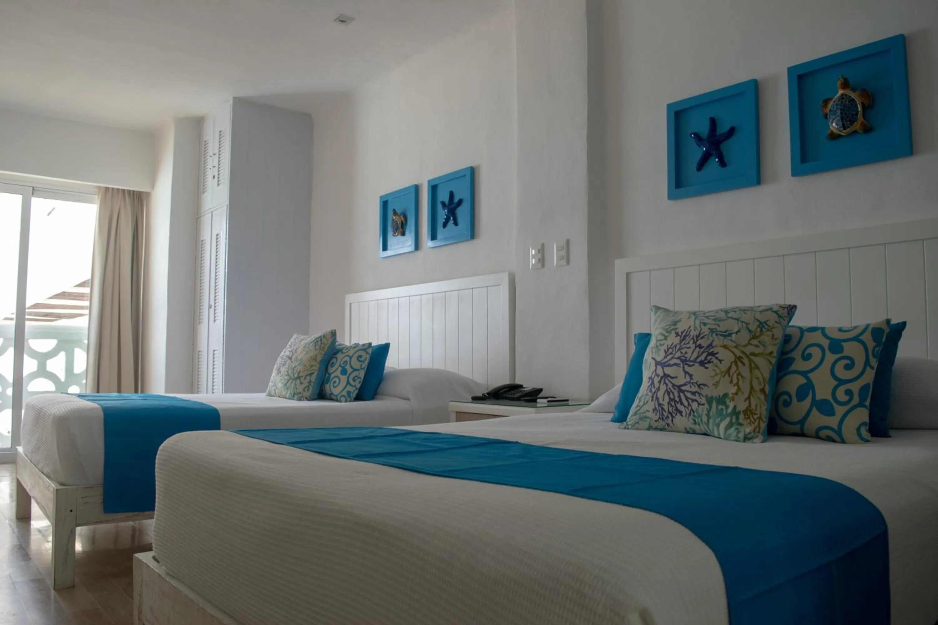 Bed in BSEA Cancun Plaza Hotel