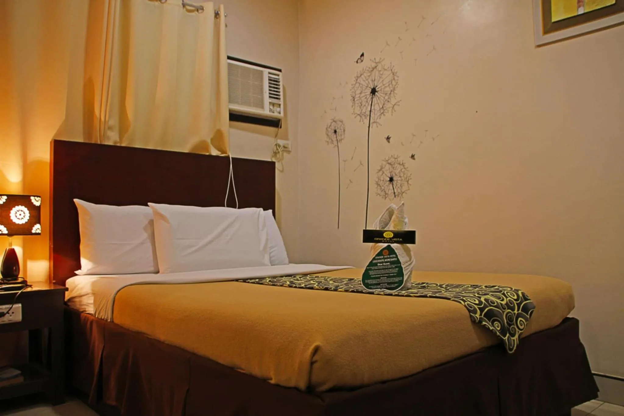 Bed in Grande Vista Hotel