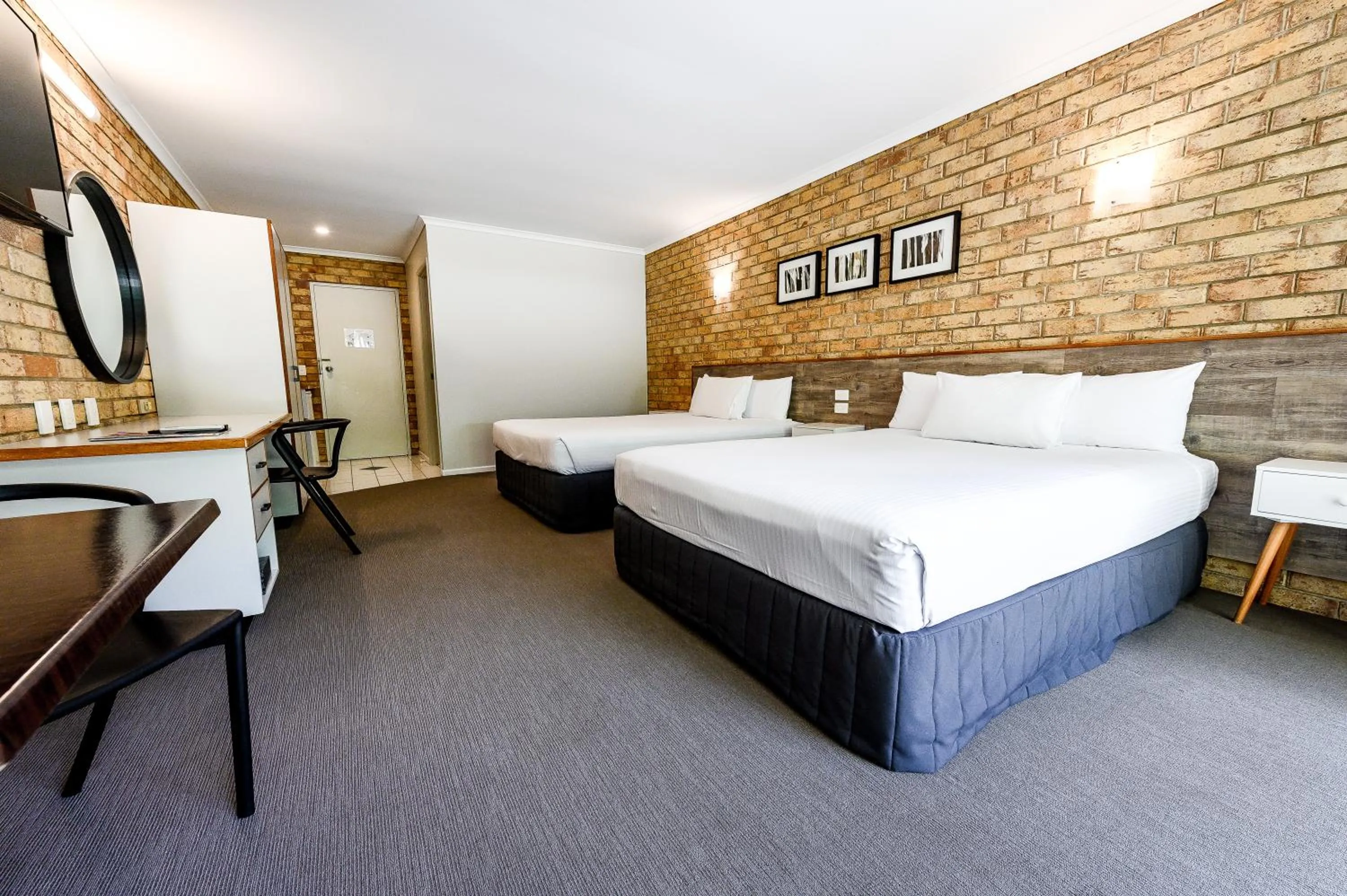 Bed in Sunshine Coast Motor Lodge