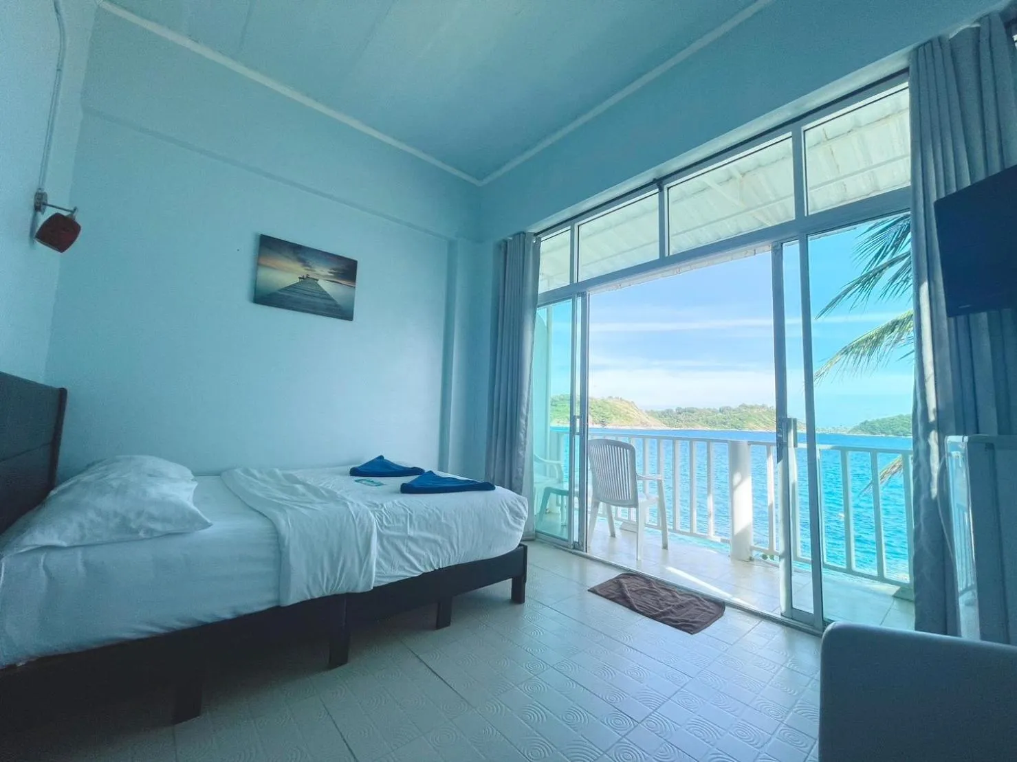 Bed in Naiharn On The Rock Resort Phuket