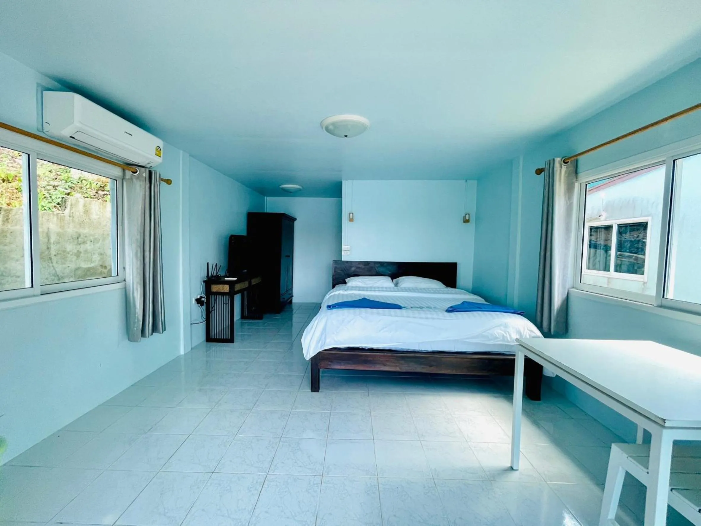 Bed in Naiharn On The Rock Resort Phuket