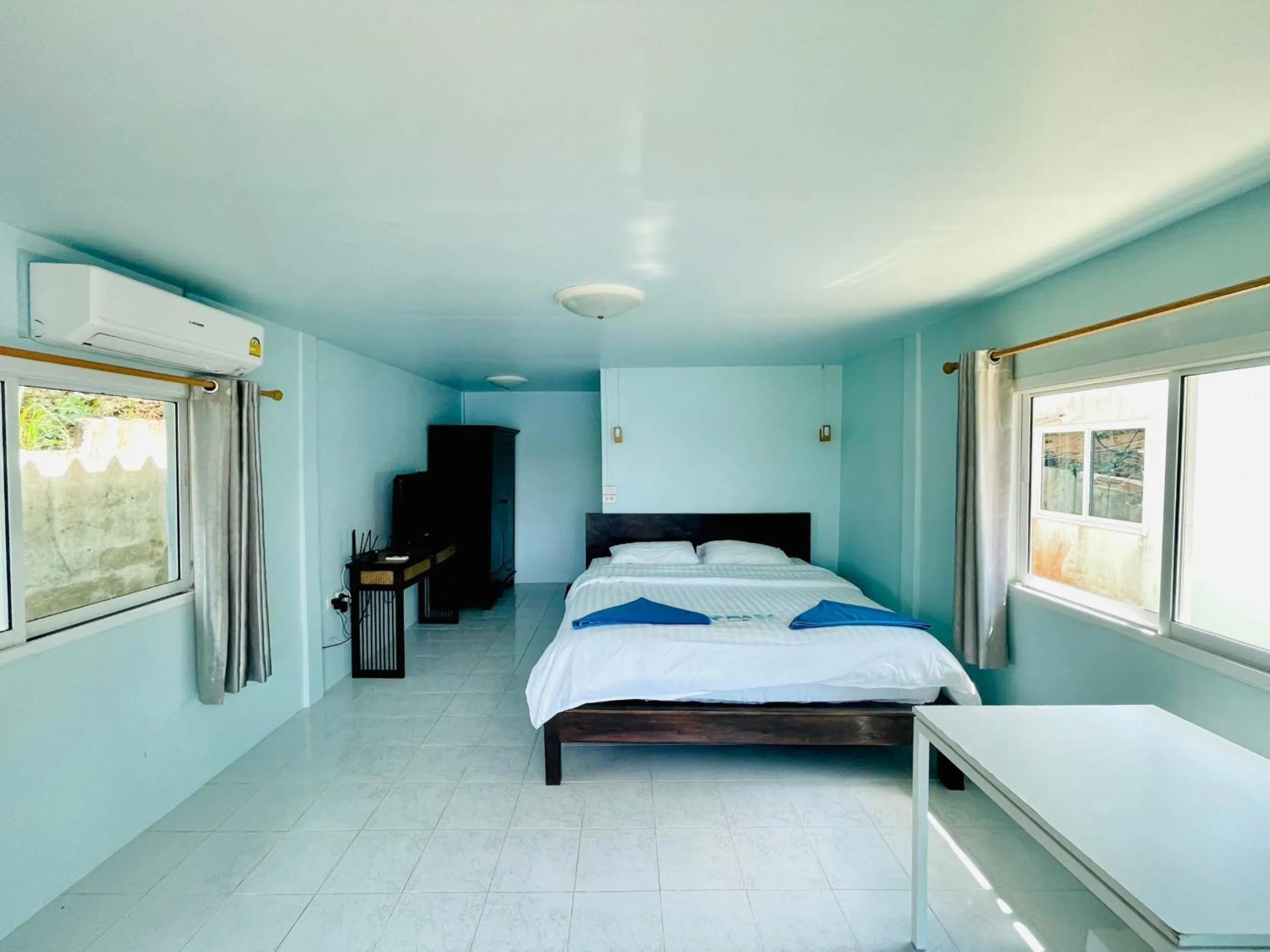 Bed in Naiharn On The Rock Resort Phuket