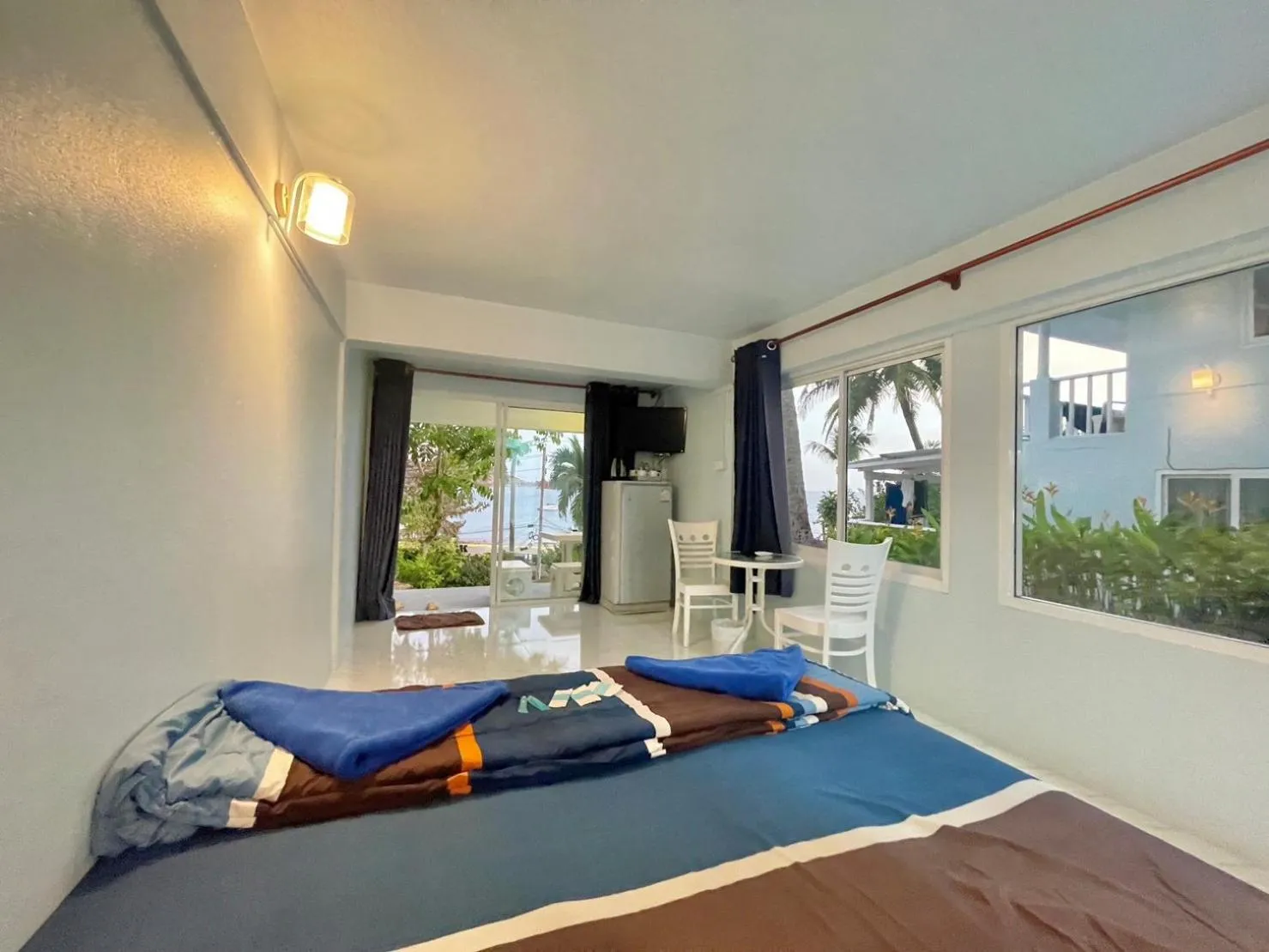 Bed in Naiharn On The Rock Resort Phuket