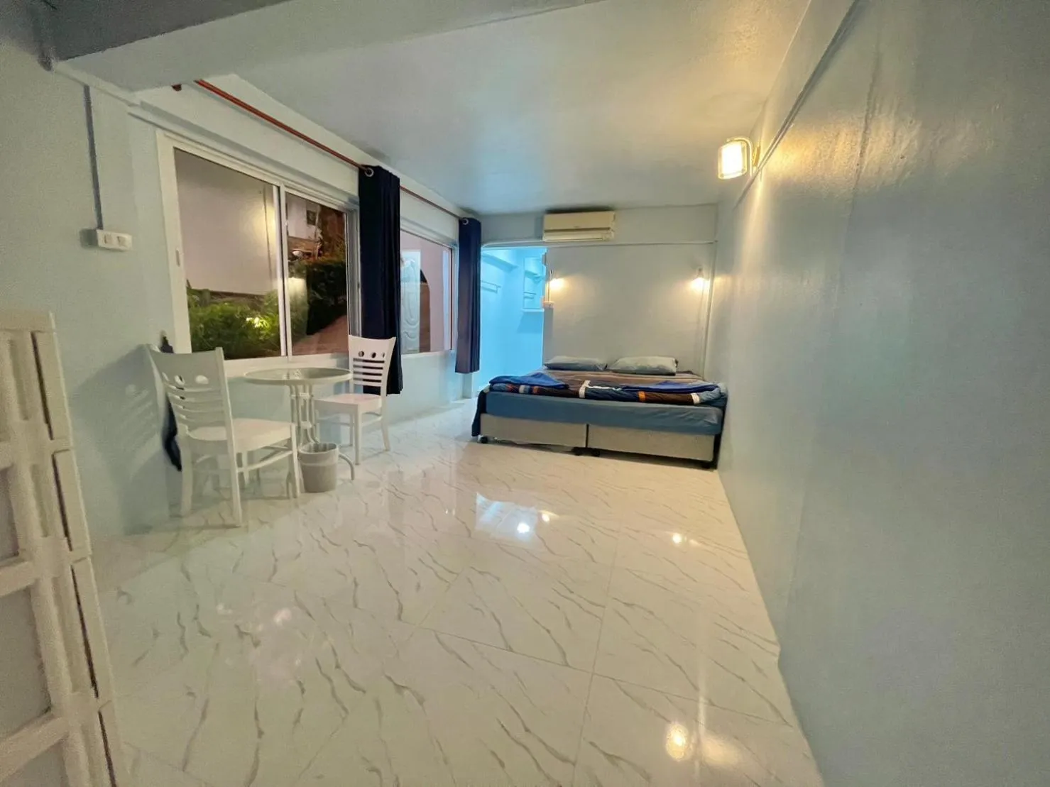 Bed in Naiharn On The Rock Resort Phuket