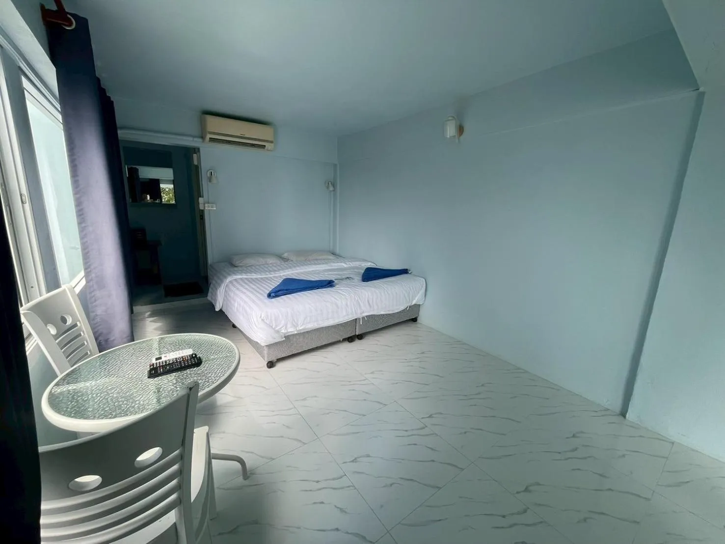 Bed in Naiharn On The Rock Resort Phuket