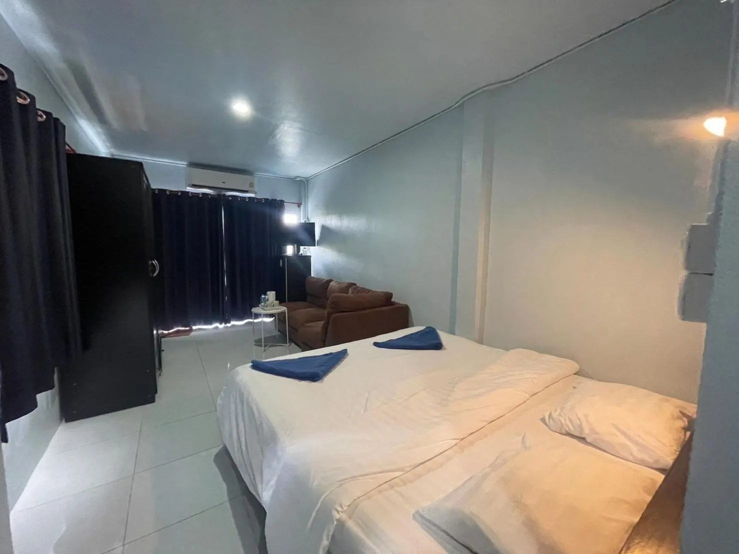 Bed in Naiharn On The Rock Resort Phuket