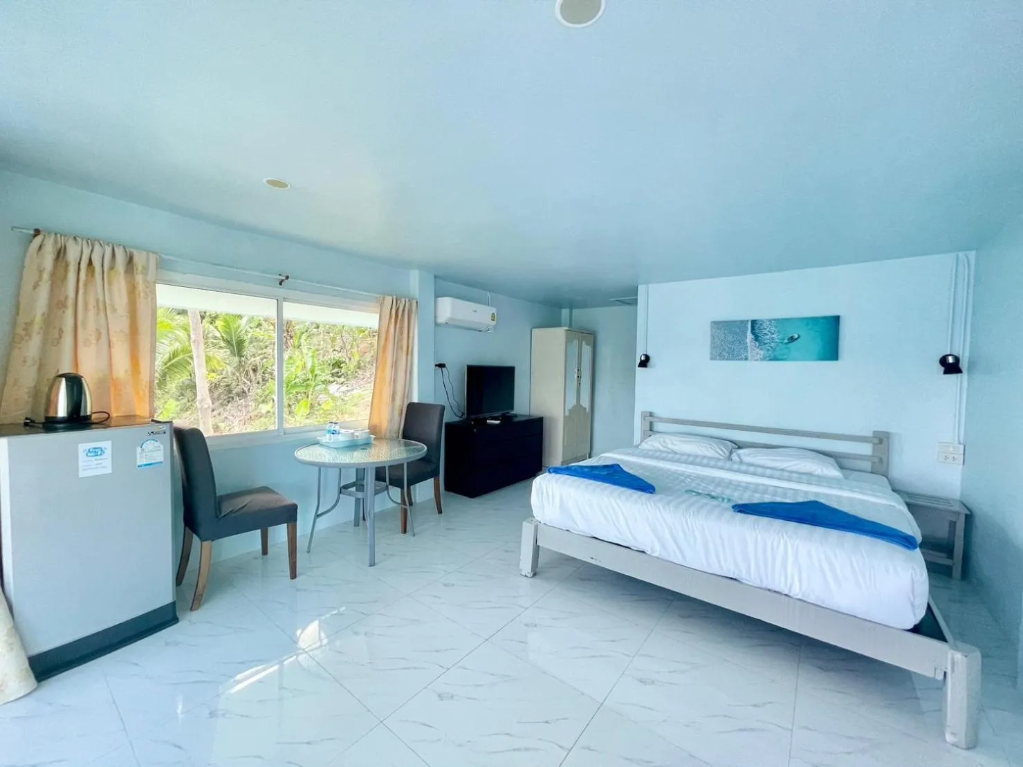 Bed in Naiharn On The Rock Resort Phuket
