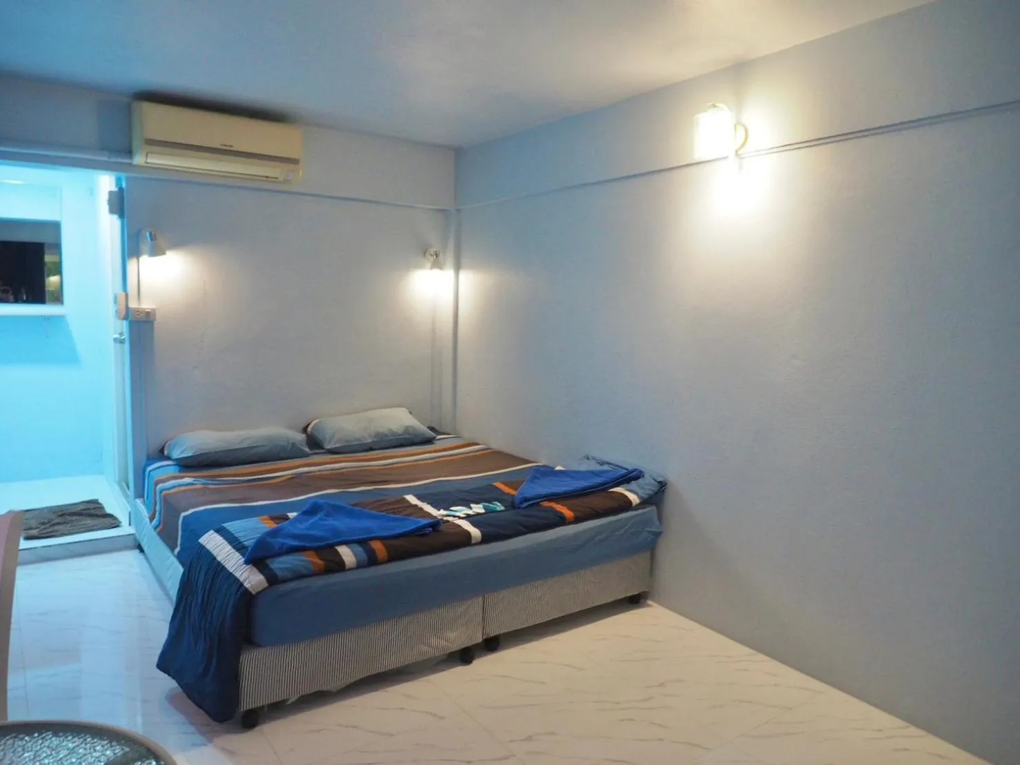 Bed in Naiharn On The Rock Resort Phuket