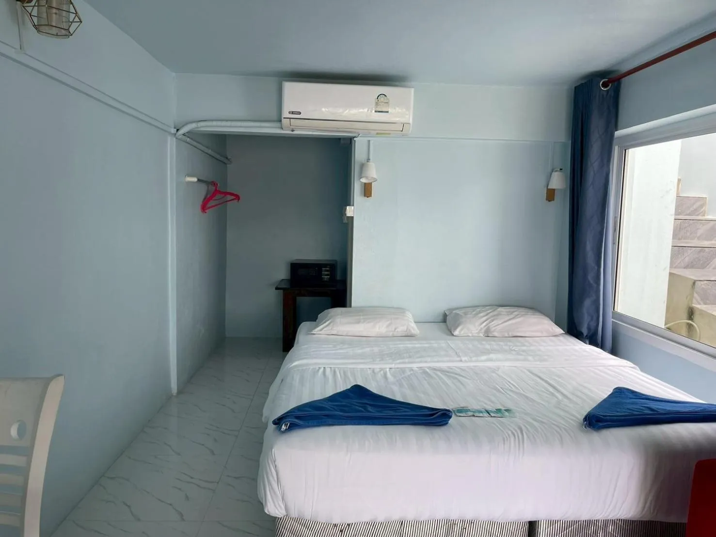 Bed in Naiharn On The Rock Resort Phuket