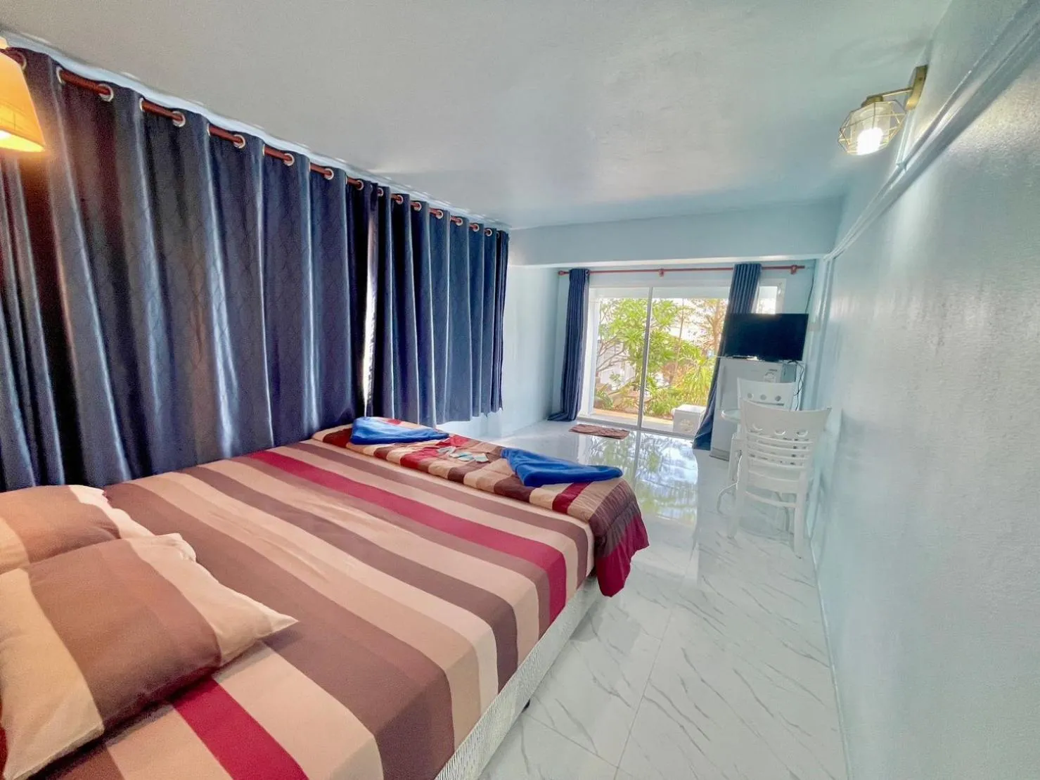 Bed in Naiharn On The Rock Resort Phuket