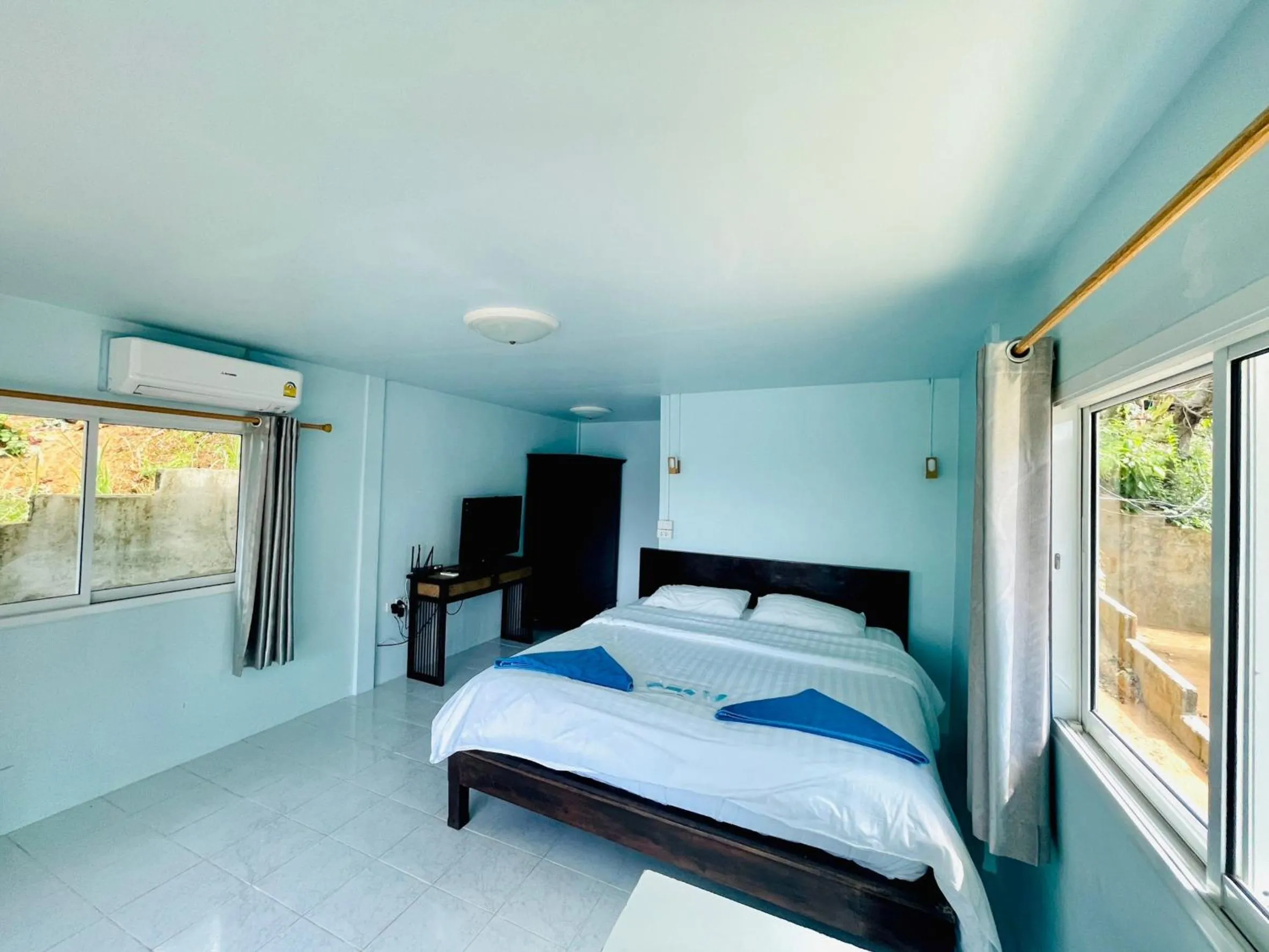 Bed in Naiharn On The Rock Resort Phuket