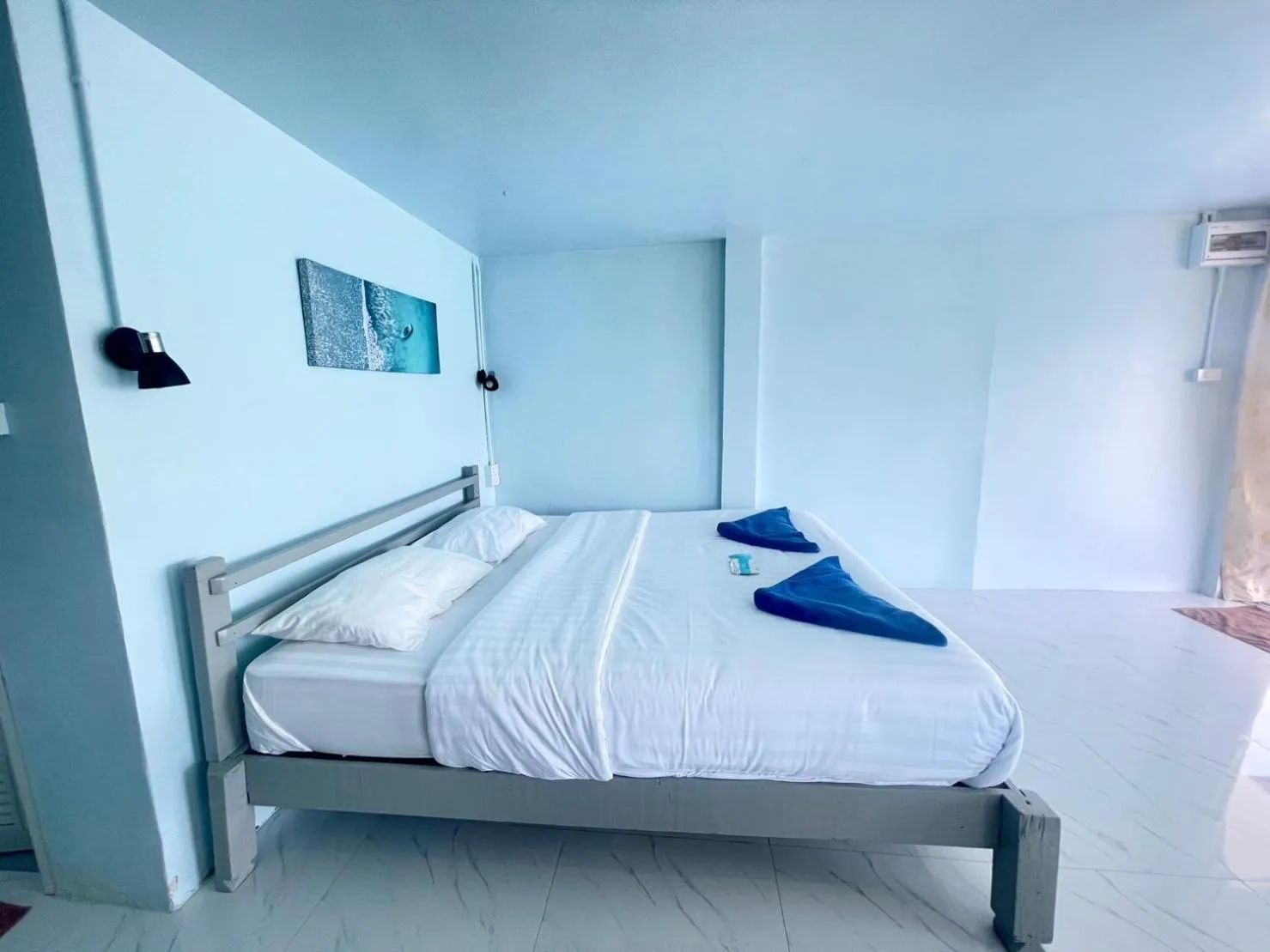 Bed in Naiharn On The Rock Resort Phuket