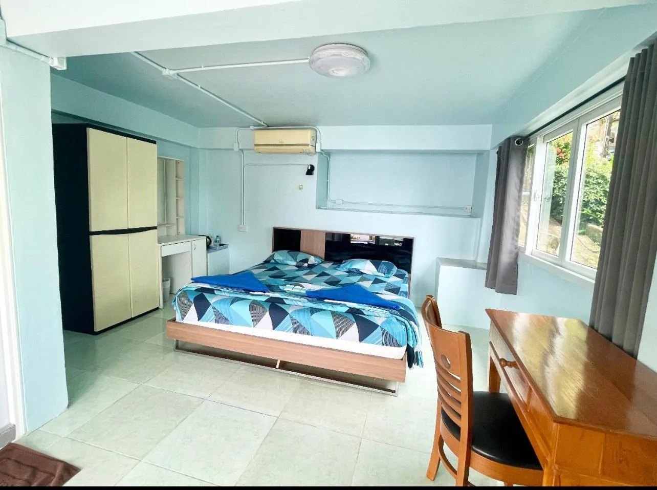 Bed in Naiharn On The Rock Resort Phuket