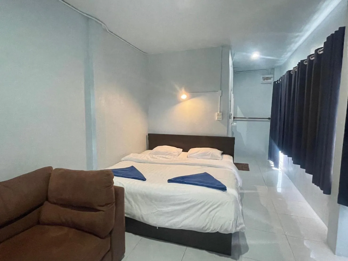 Bed in Naiharn On The Rock Resort Phuket