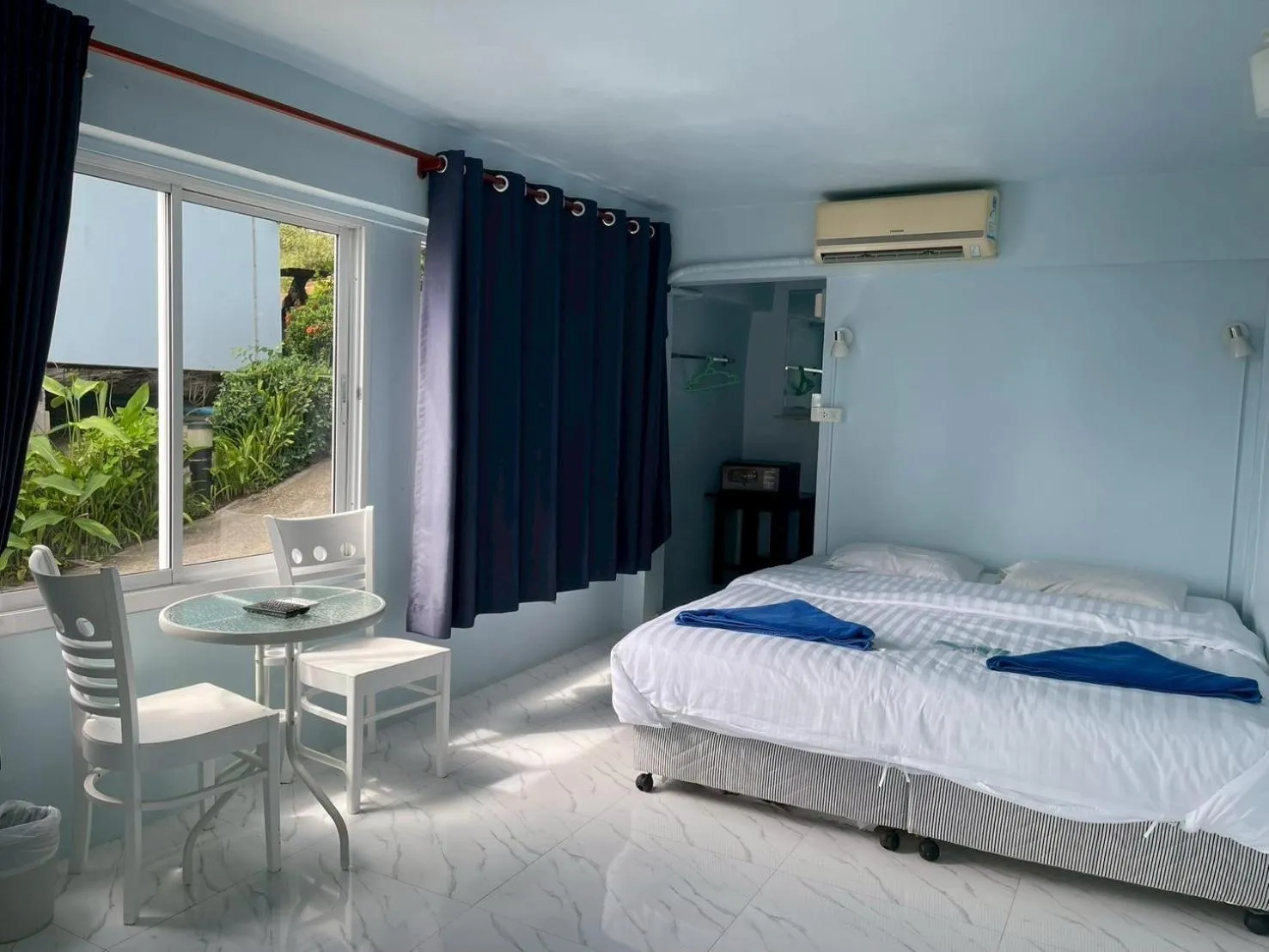 Bed in Naiharn On The Rock Resort Phuket