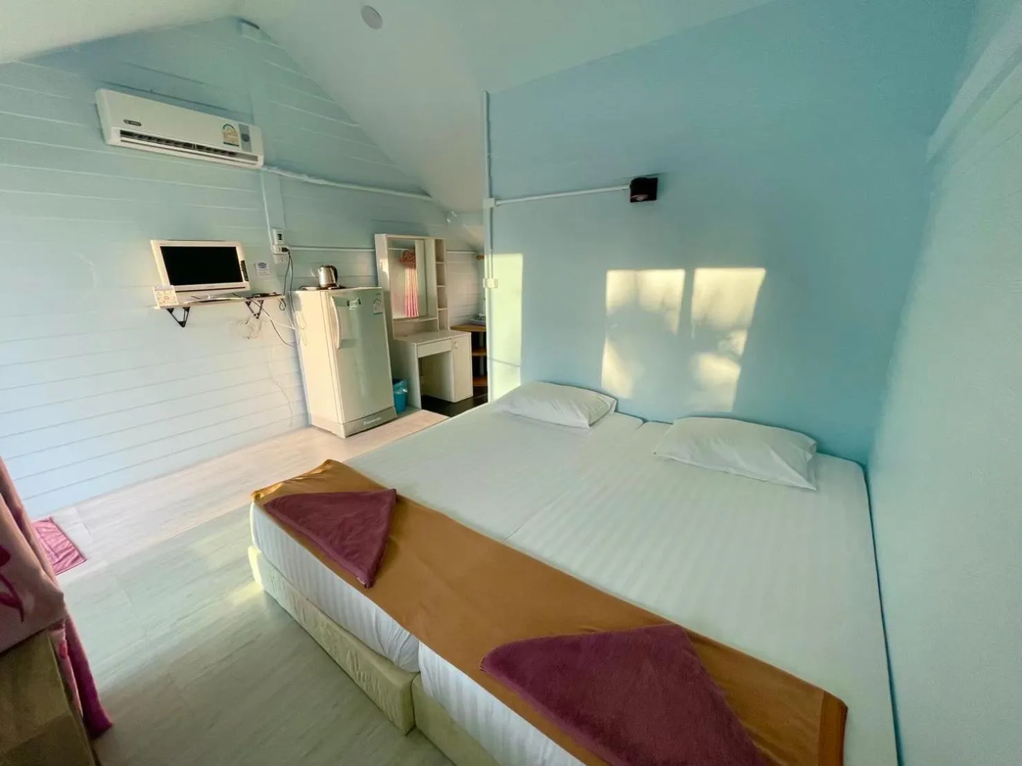 Bed in Naiharn On The Rock Resort Phuket