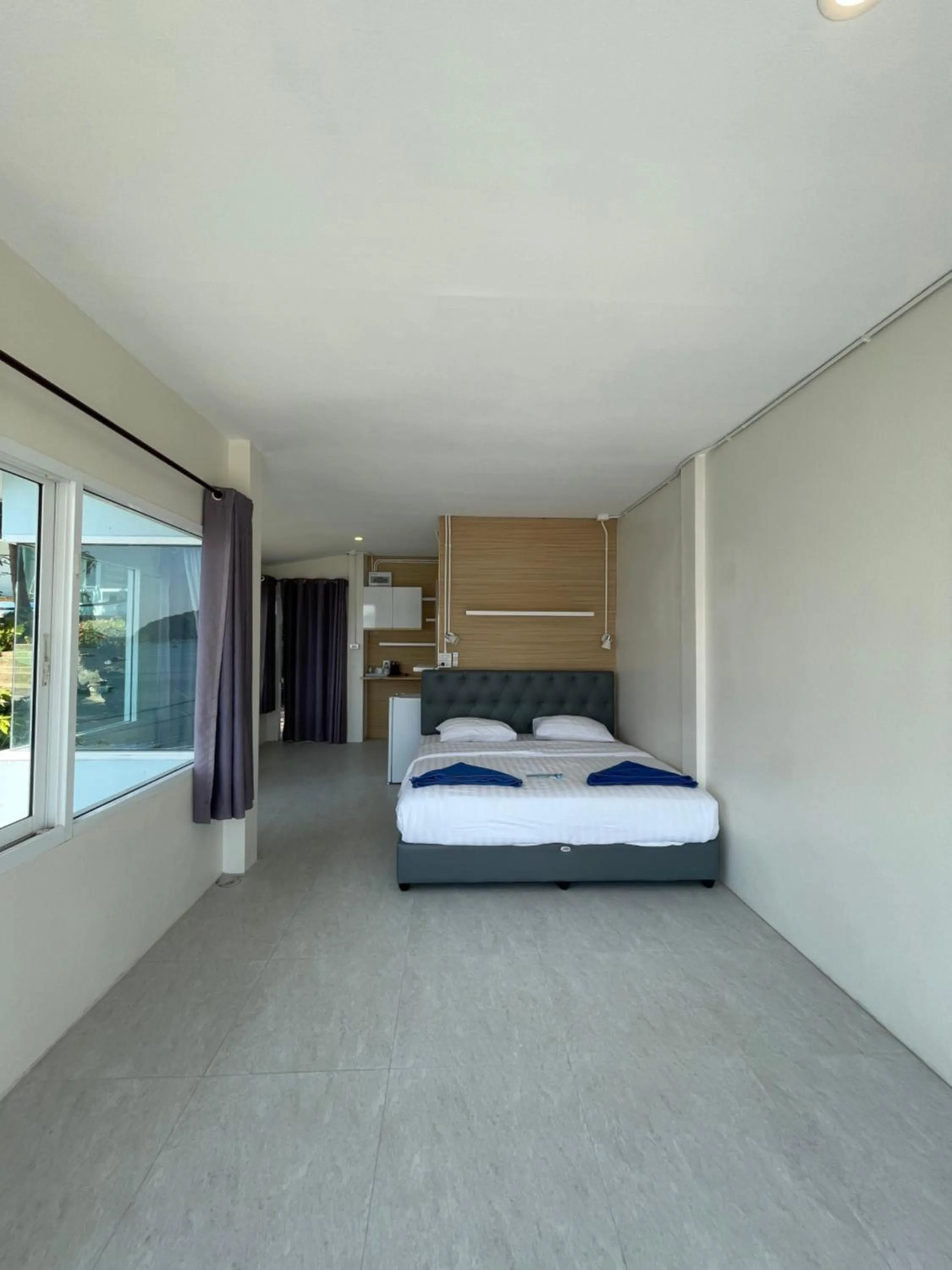 Bed in Naiharn On The Rock Resort Phuket