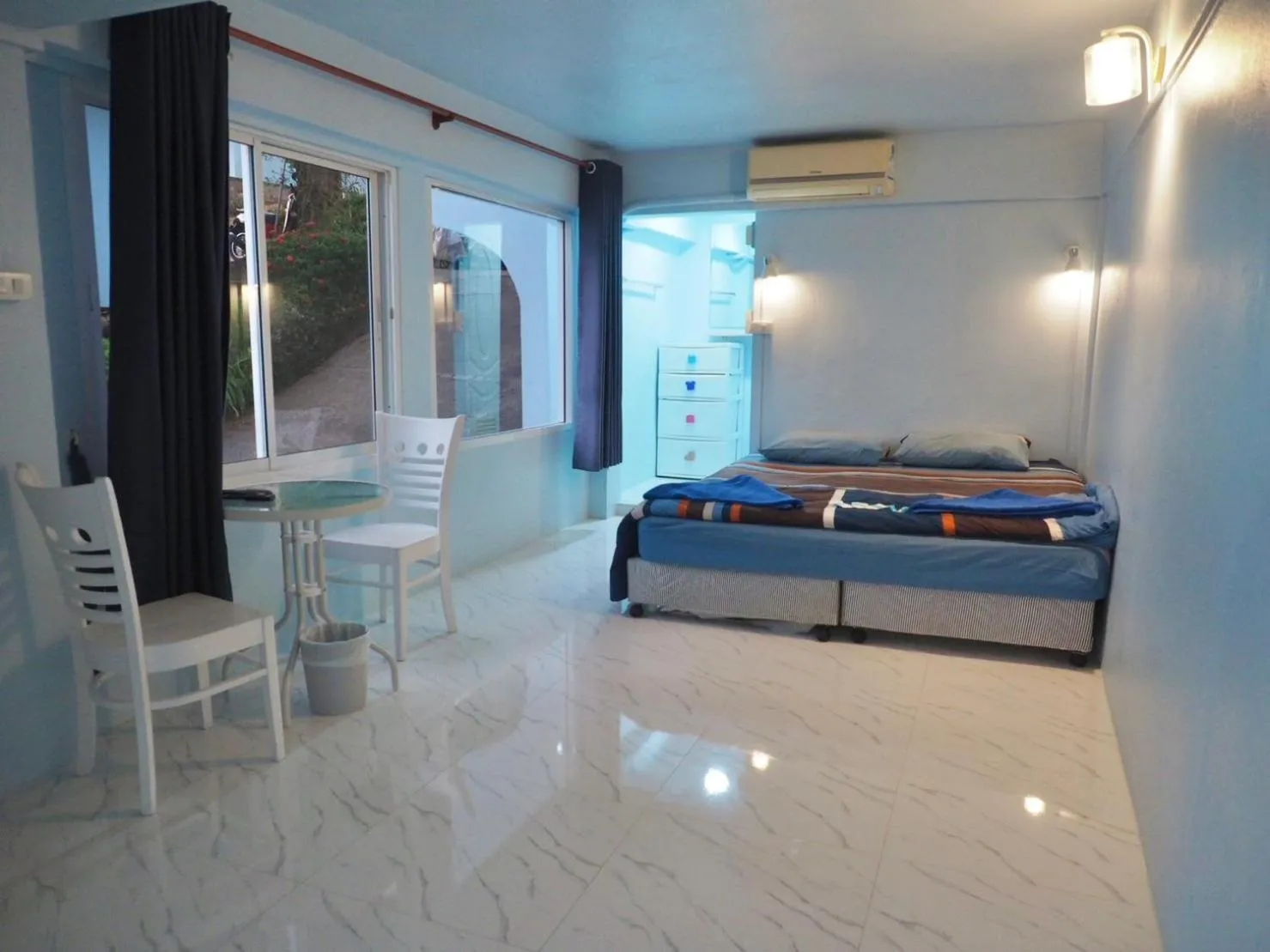 Bed in Naiharn On The Rock Resort Phuket