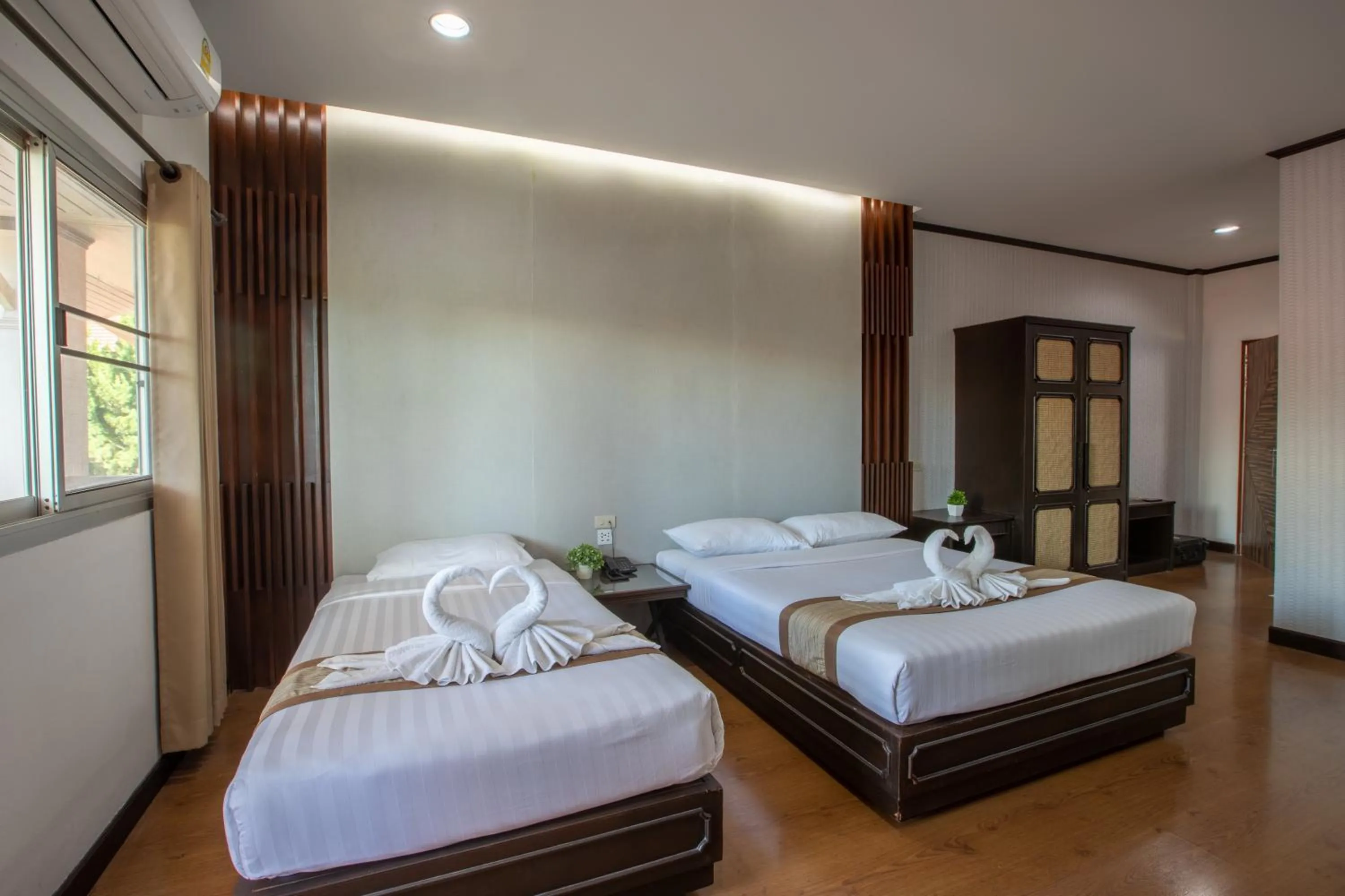 Bed in Pimann Inn Hotel