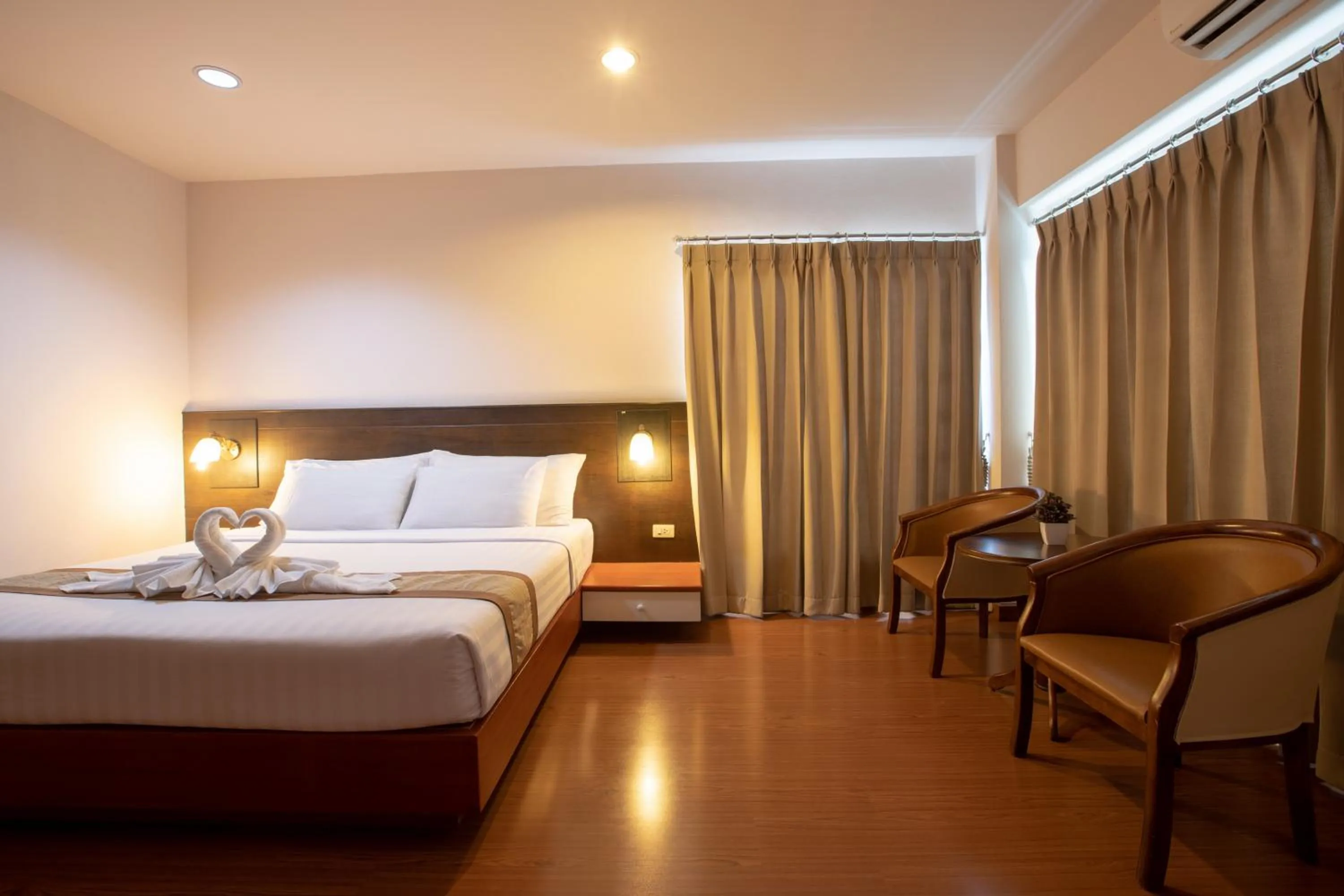 Bed in Pimann Inn Hotel