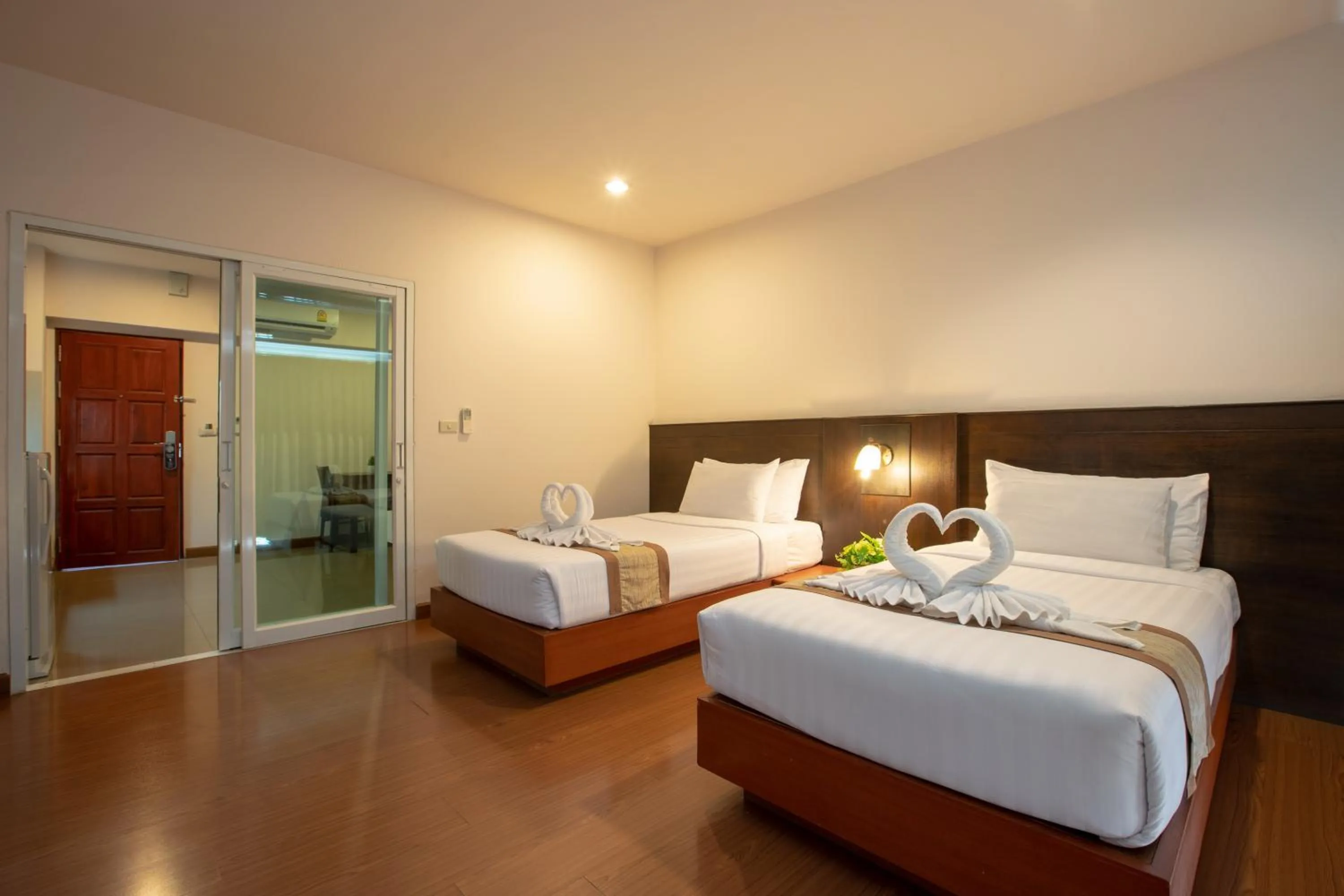 Bed in Pimann Inn Hotel