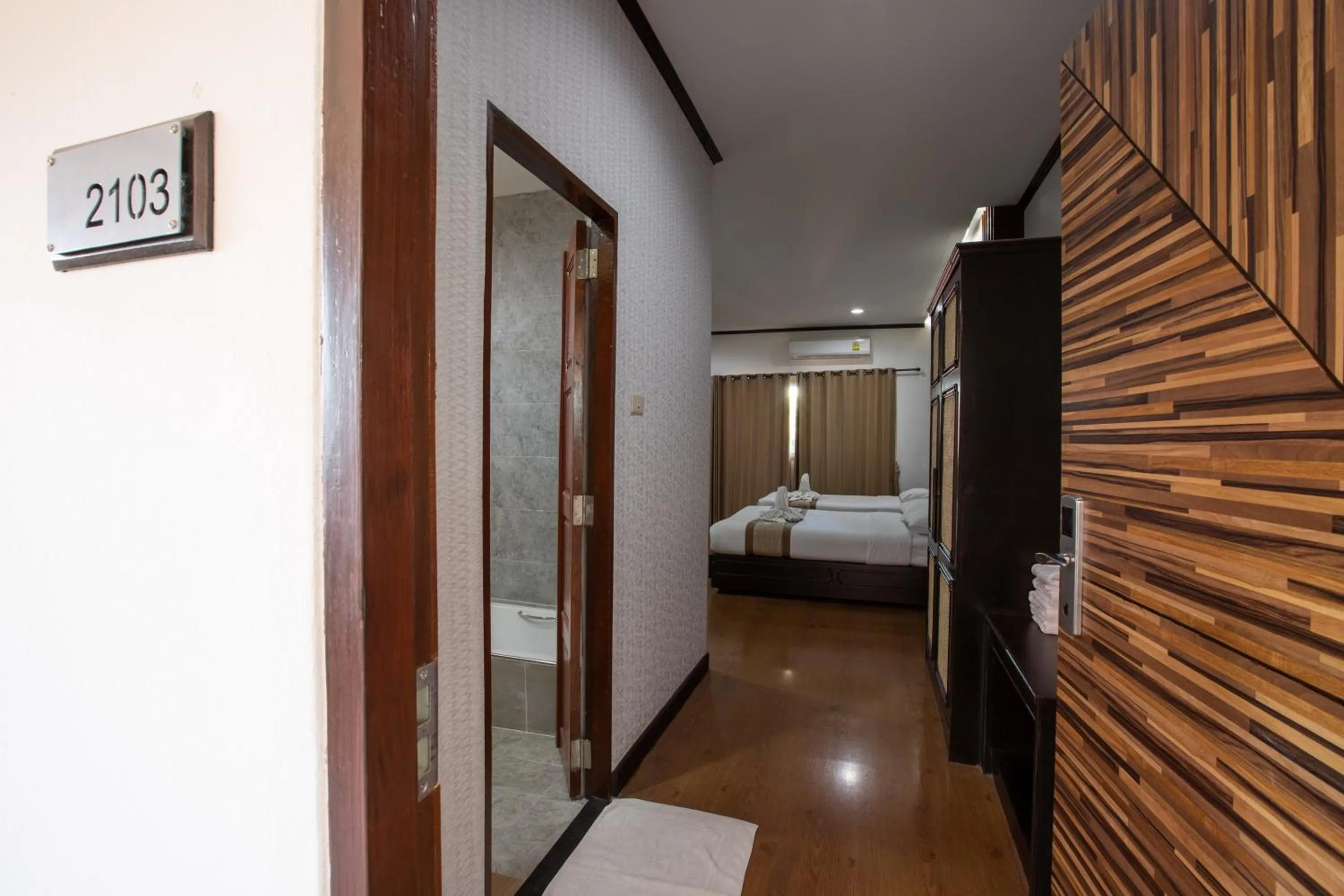 Bed in Pimann Inn Hotel