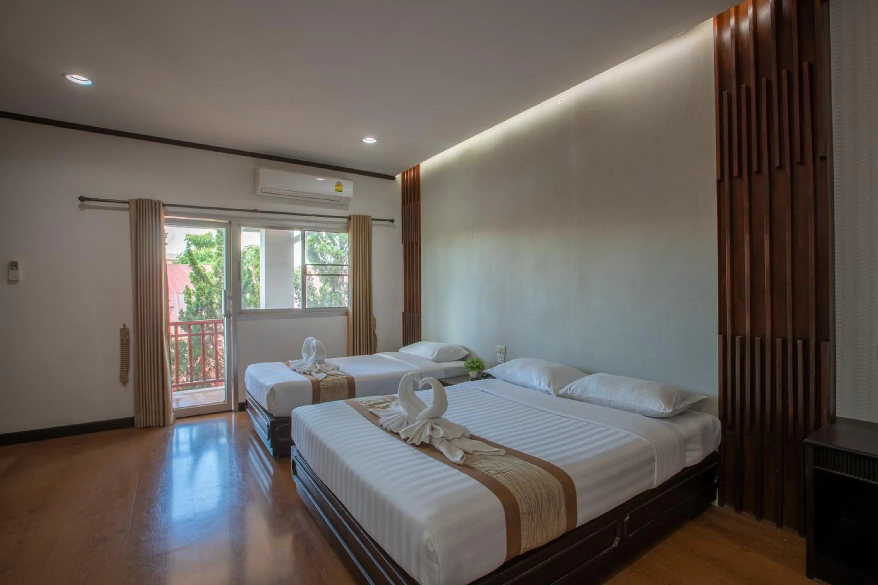 Bed in Pimann Inn Hotel