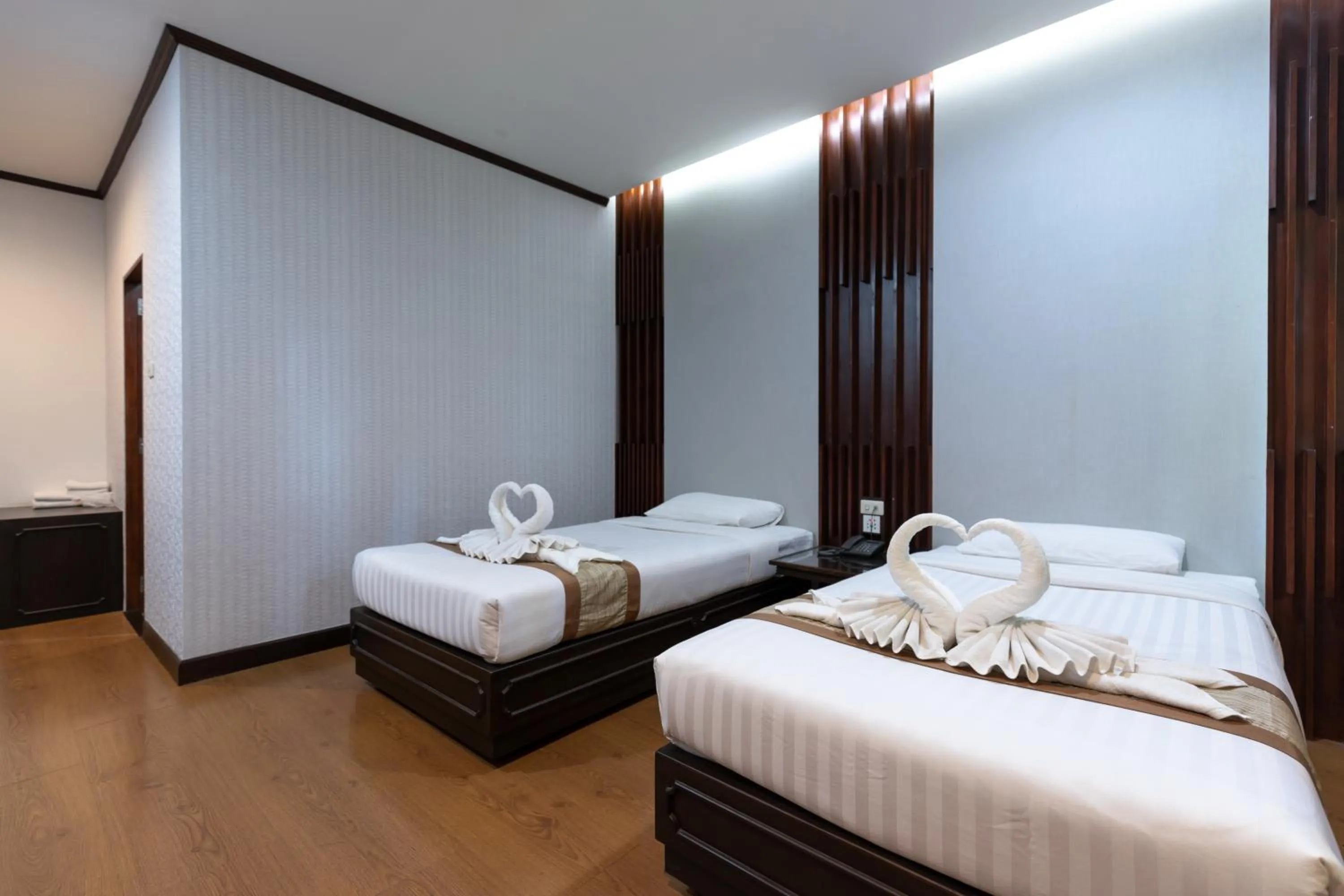 Bed in Pimann Inn Hotel