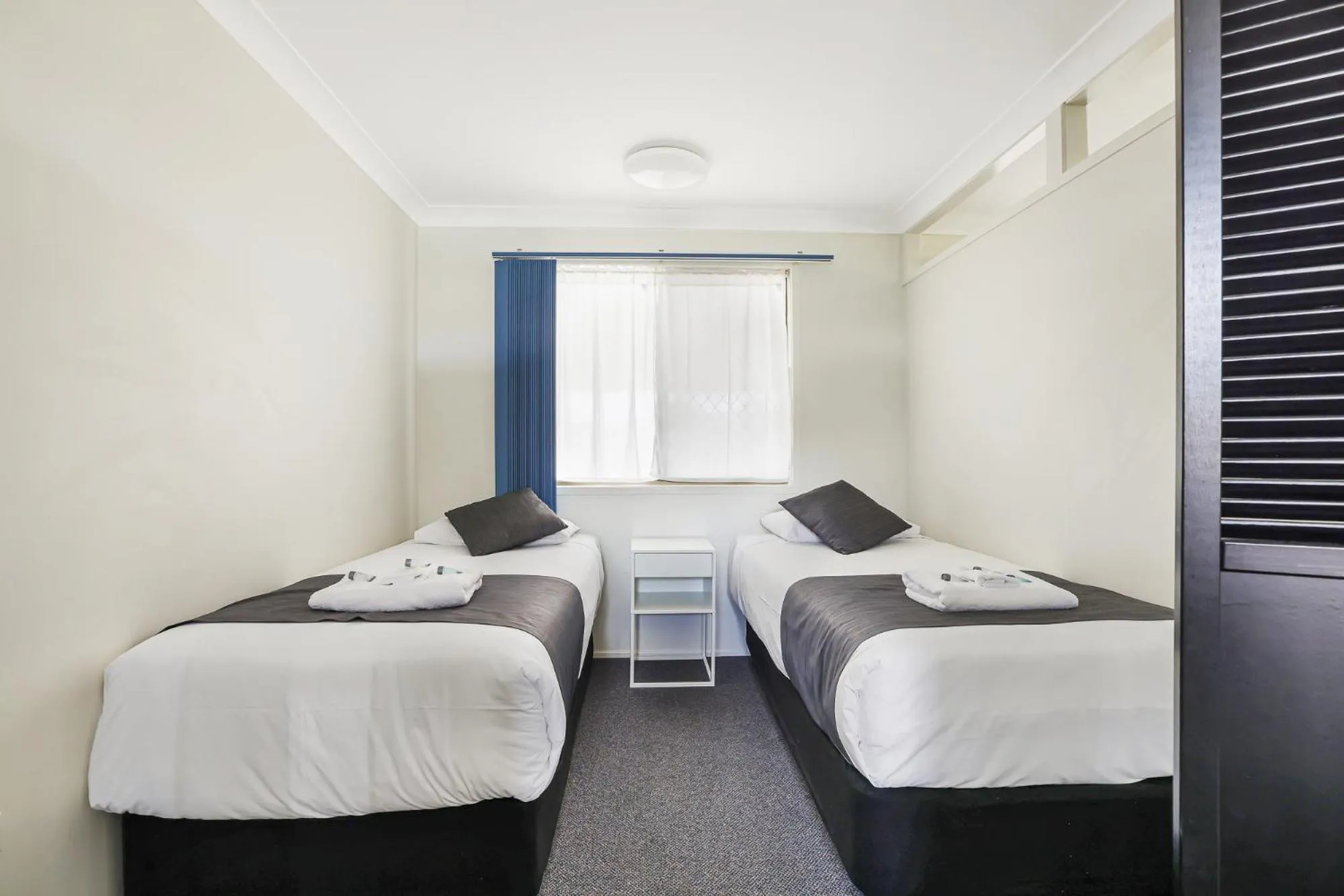 Bed in Acacia Motor Inn