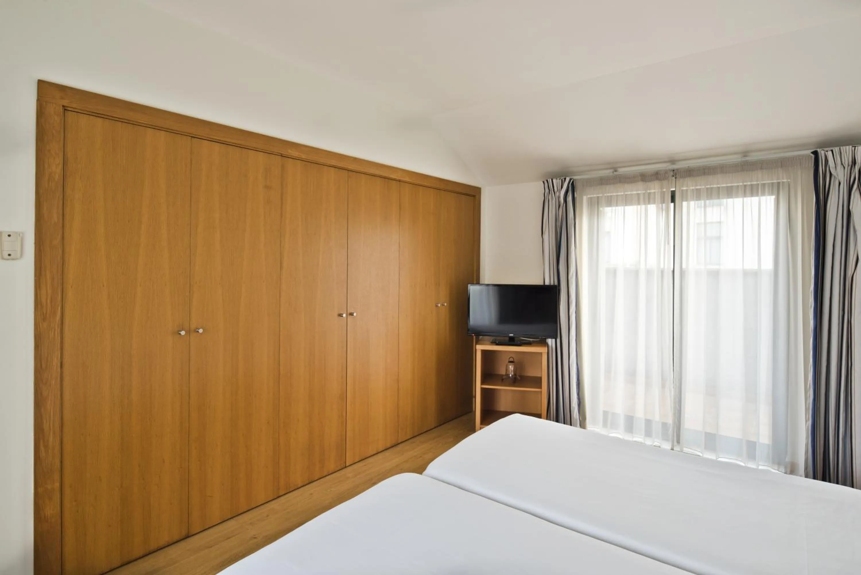 Bed in Lam Hotel Estarreja