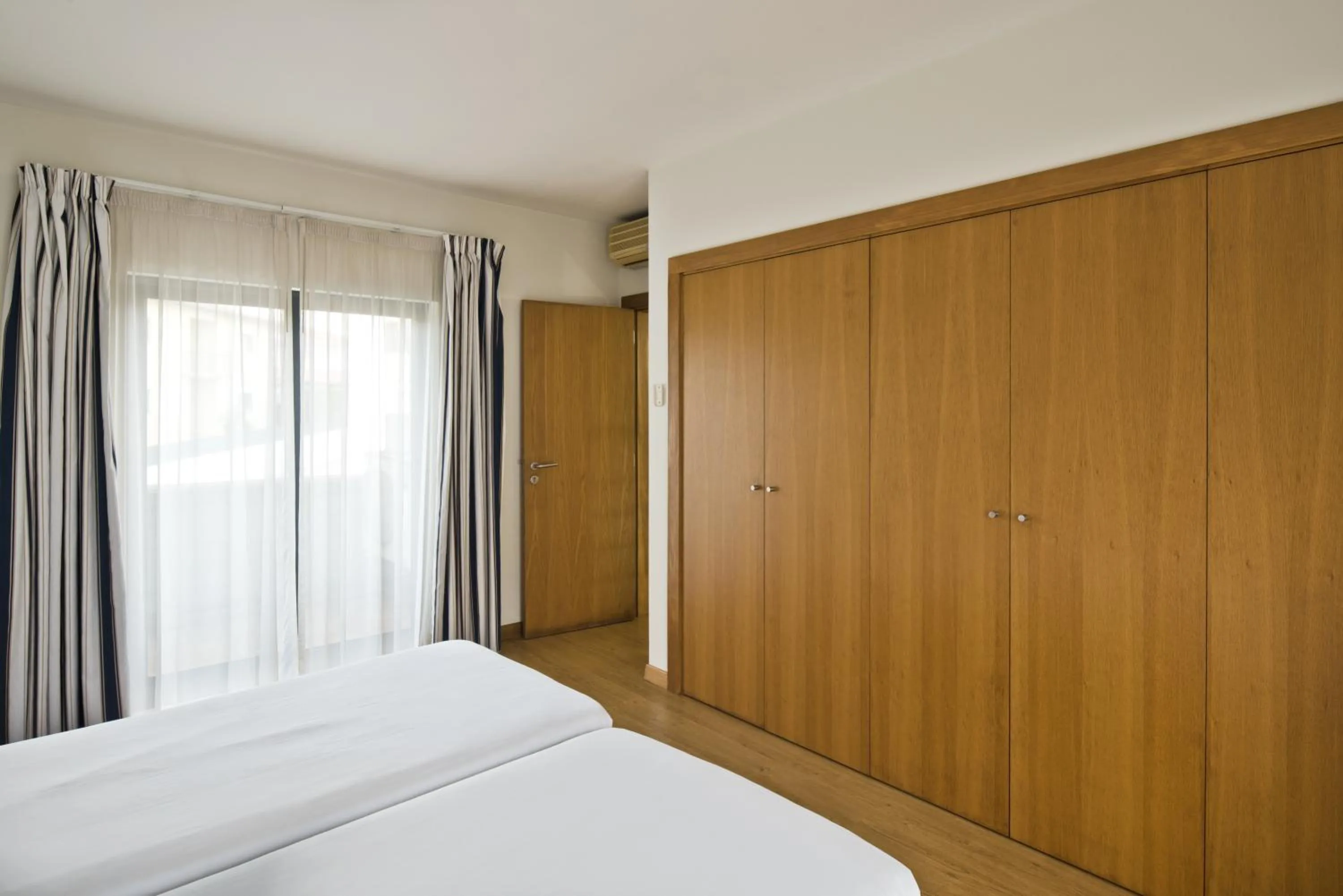 Bed in Lam Hotel Estarreja