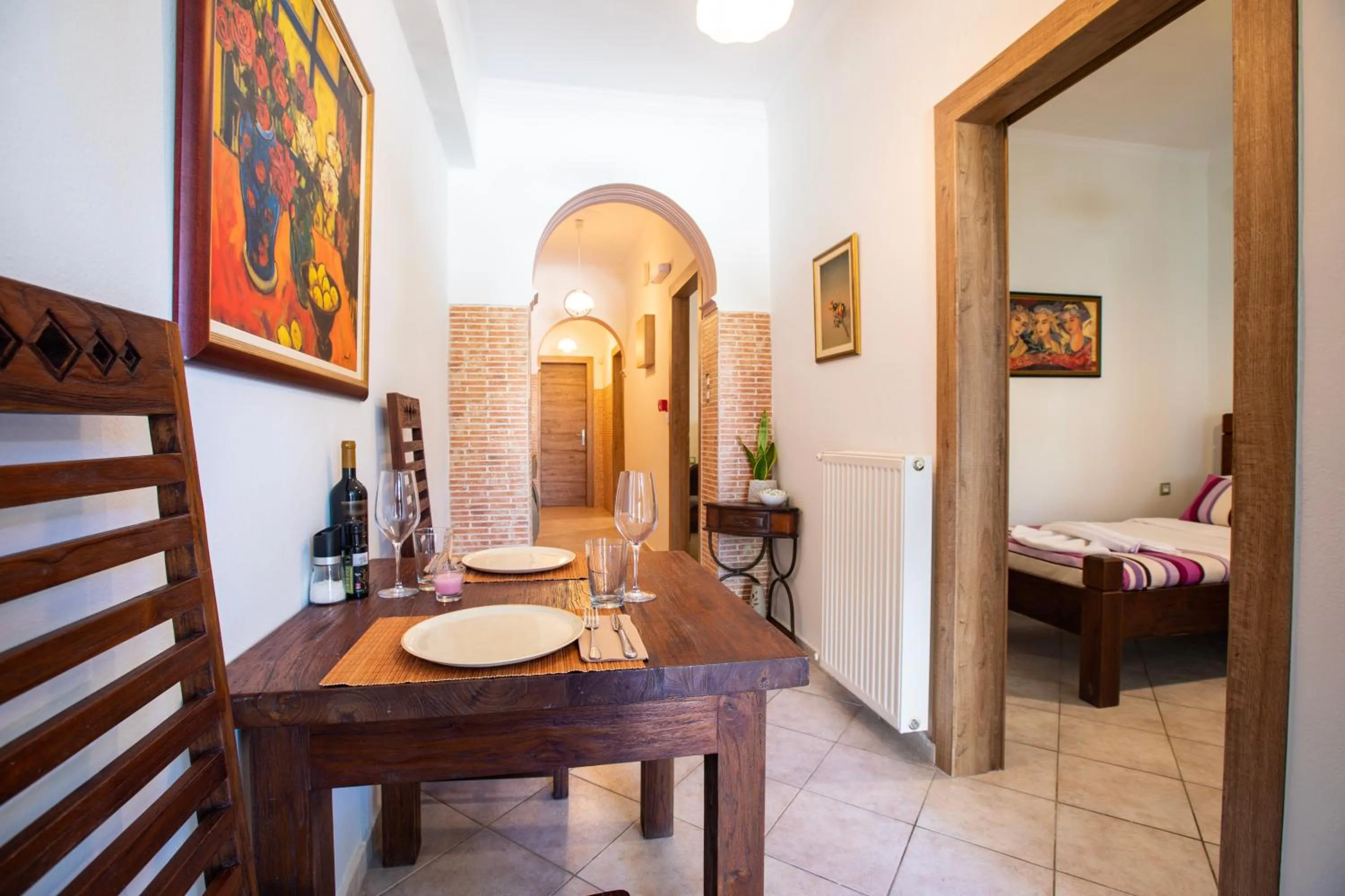 Dining area, Bed in Kastro Apartments