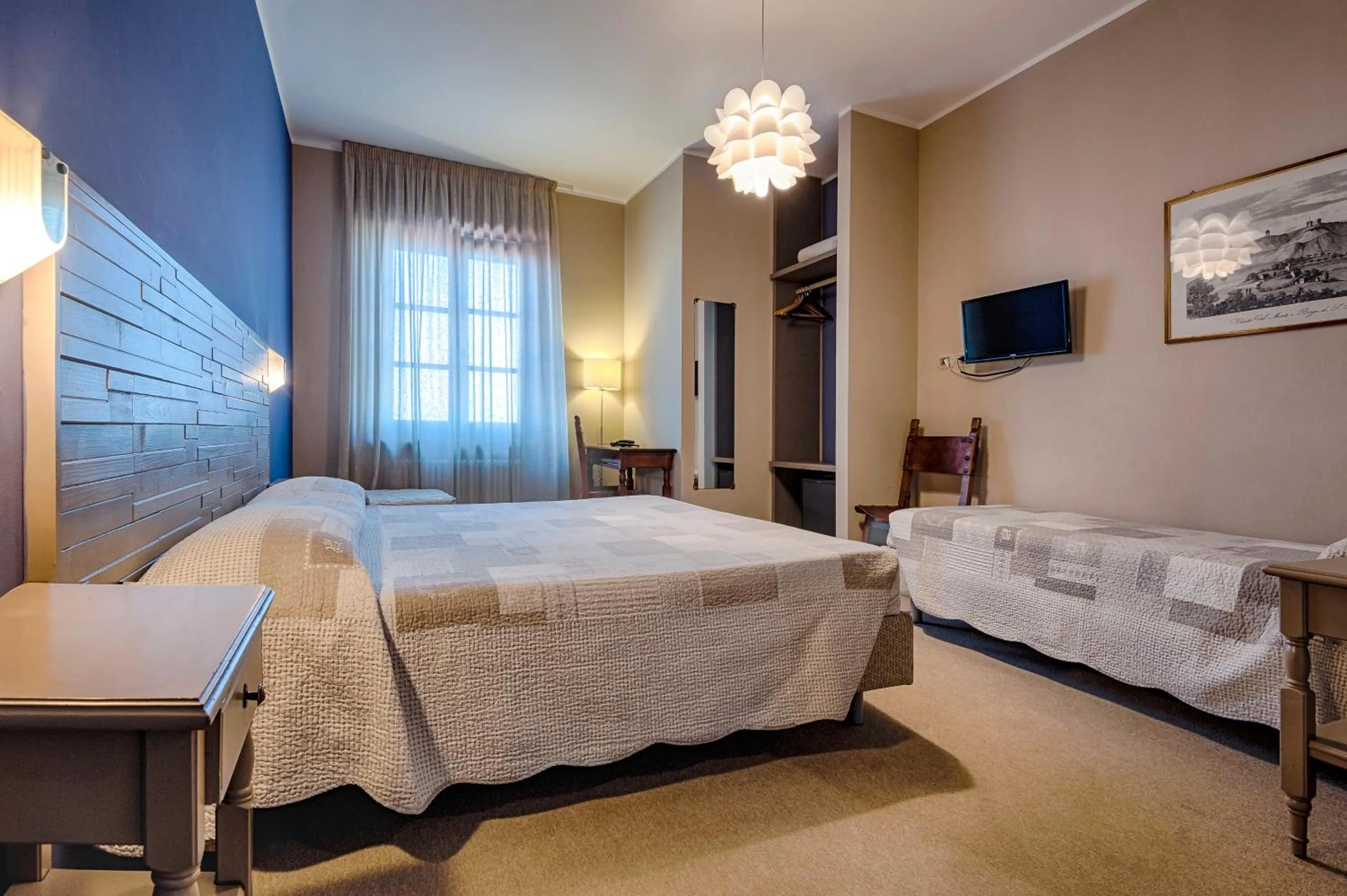 Bed in La Grotta Hotel