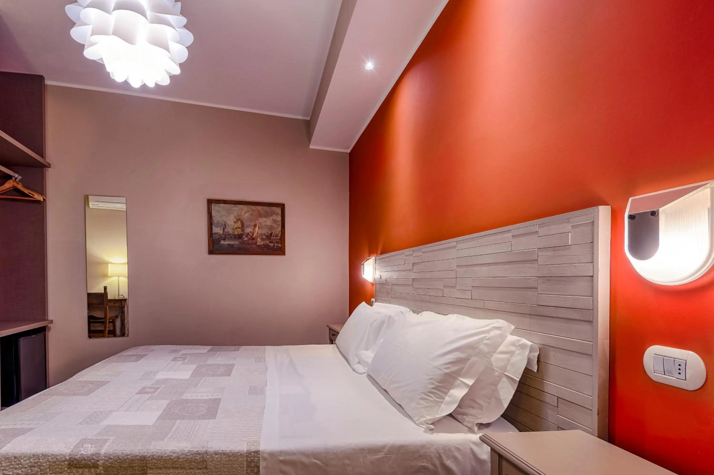 Bed in La Grotta Hotel