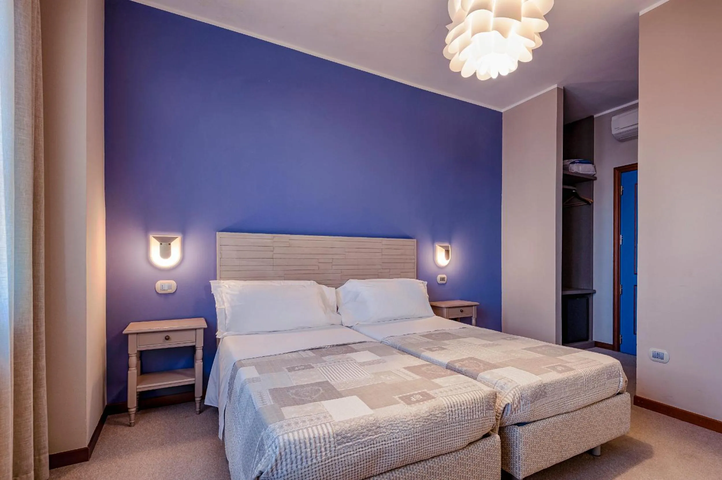 Bed in La Grotta Hotel