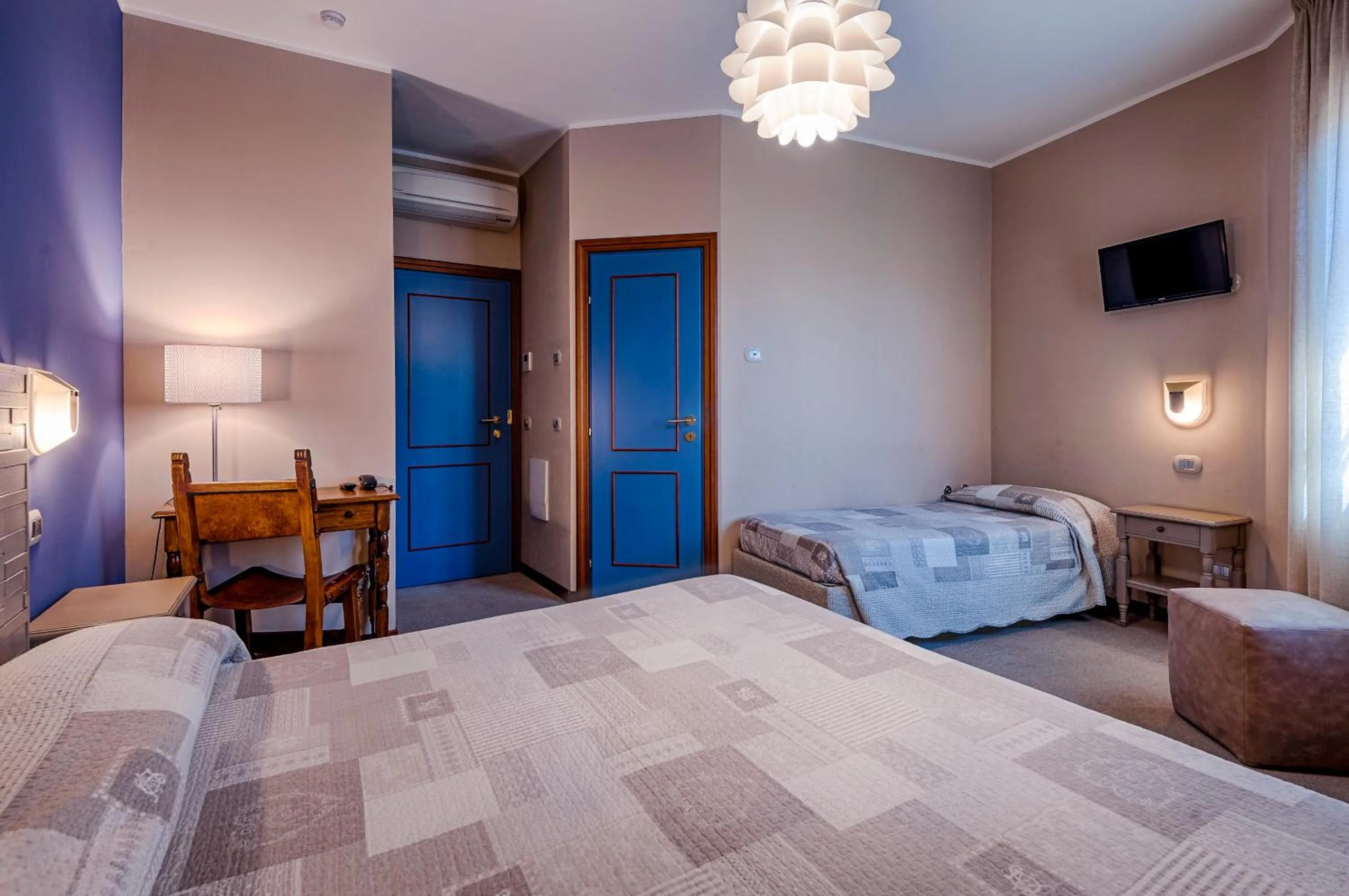 Bed in La Grotta Hotel