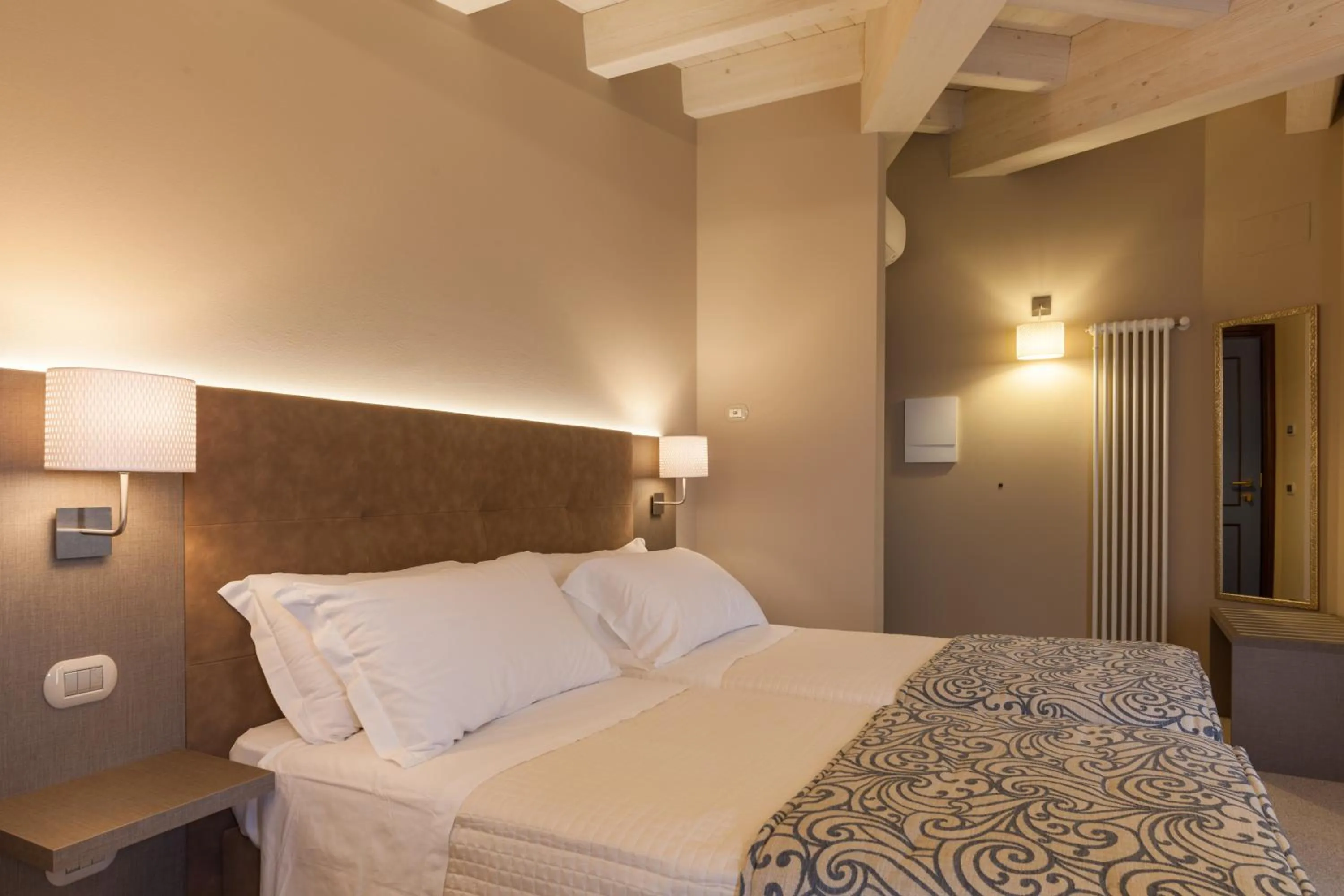 Bed in La Grotta Hotel
