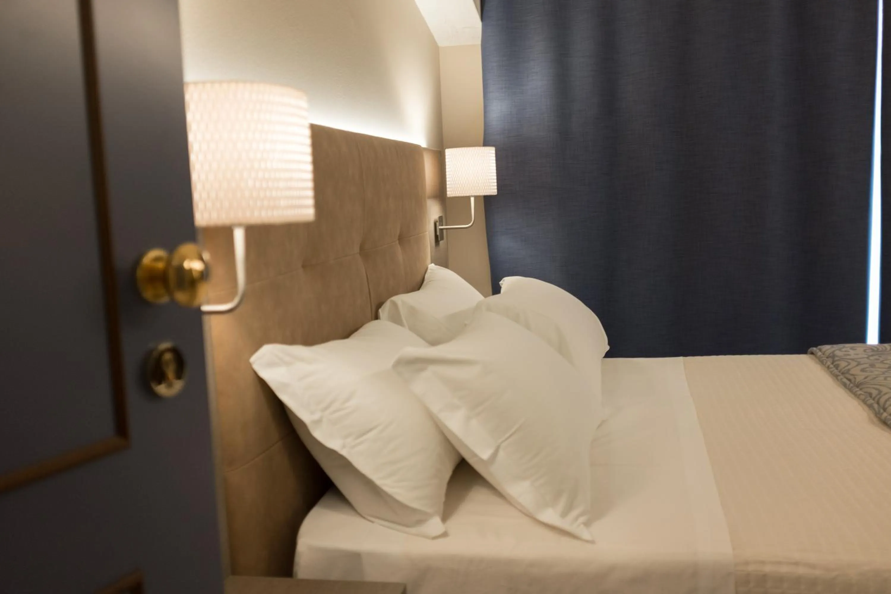 Bed in La Grotta Hotel