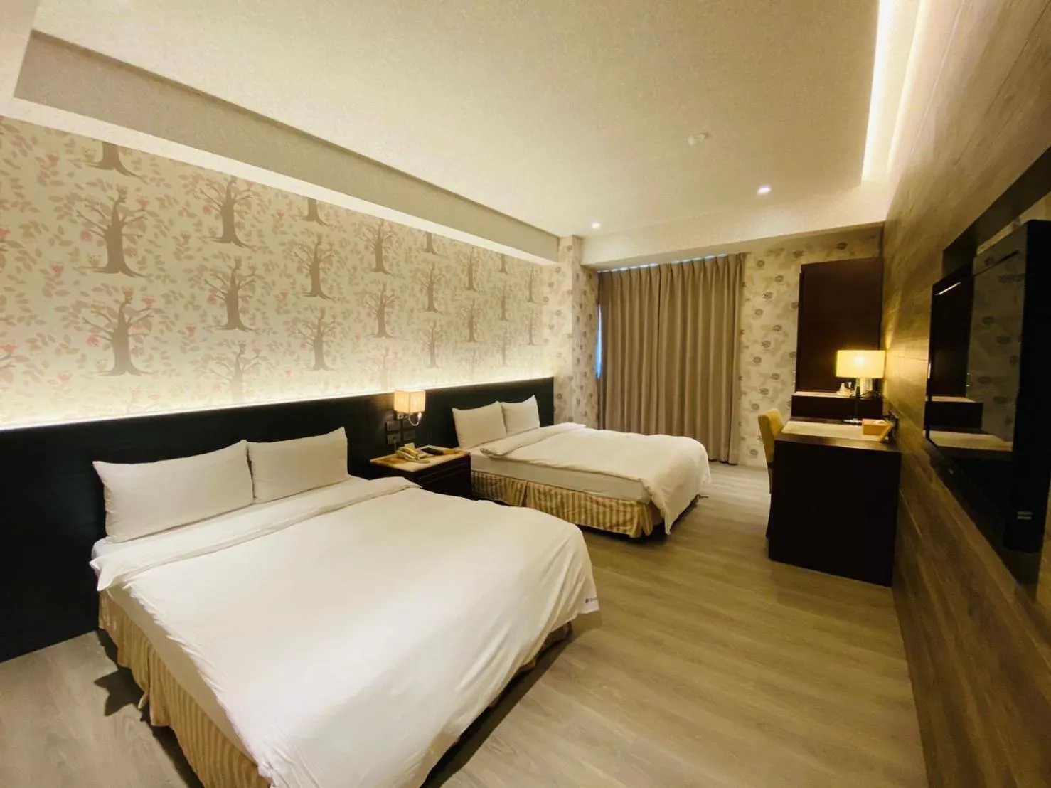 Bedroom in DLInn Hotel