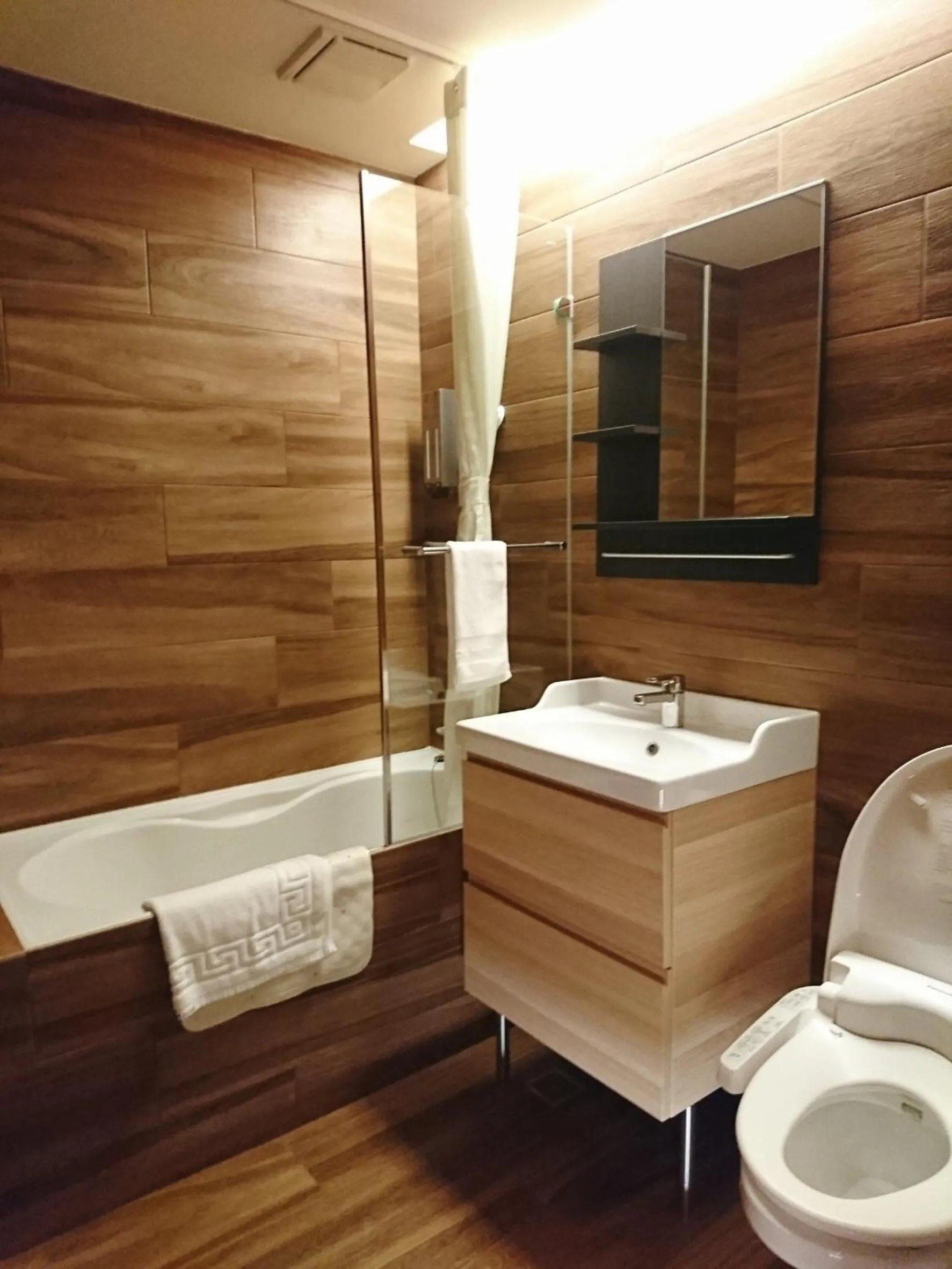 Bathroom in DLInn Hotel