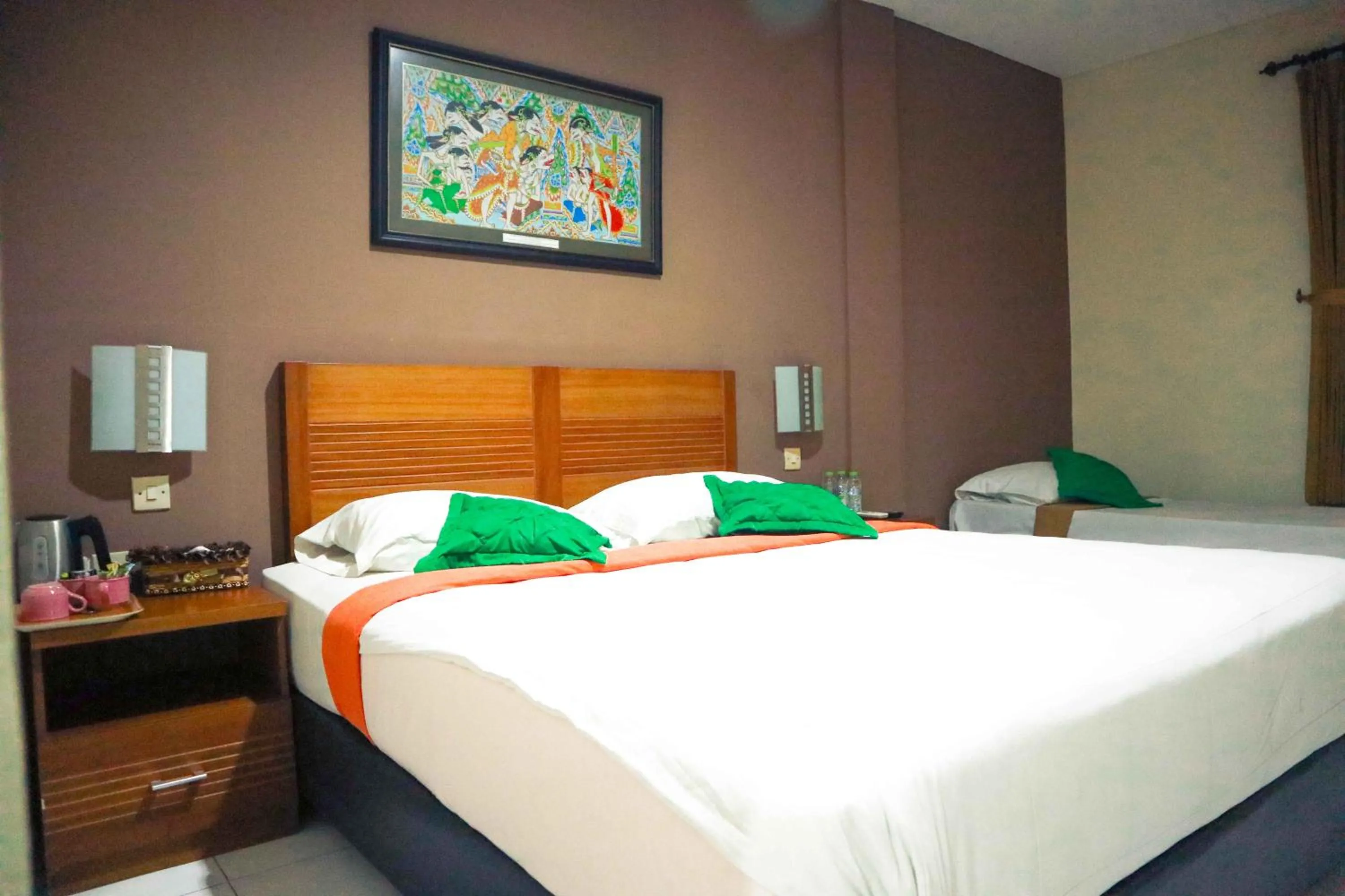 Bed in Helios Hotel Malang