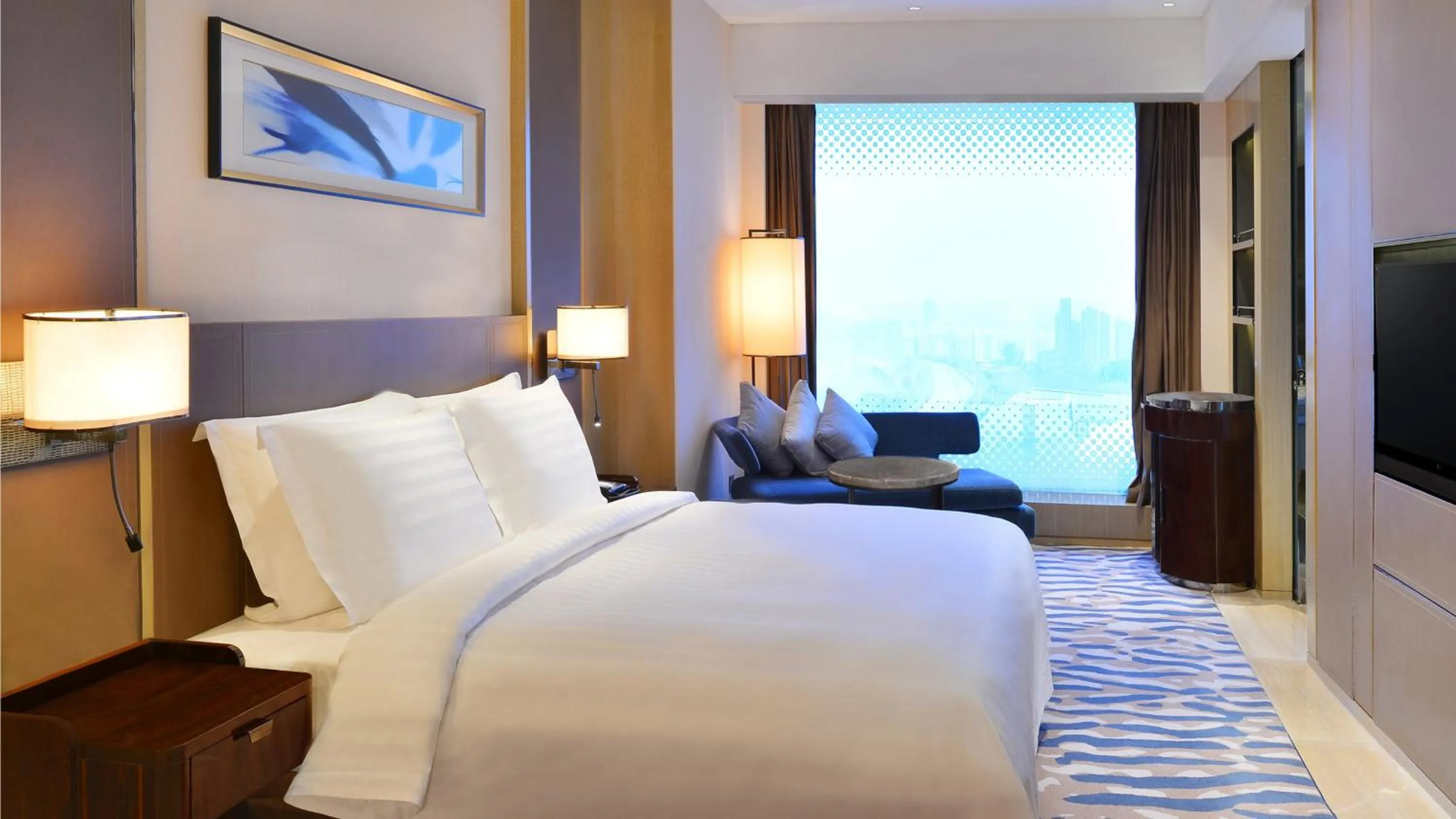 Photo of the whole room, Bed in Crowne Plaza Dalian Sports Center by IHG