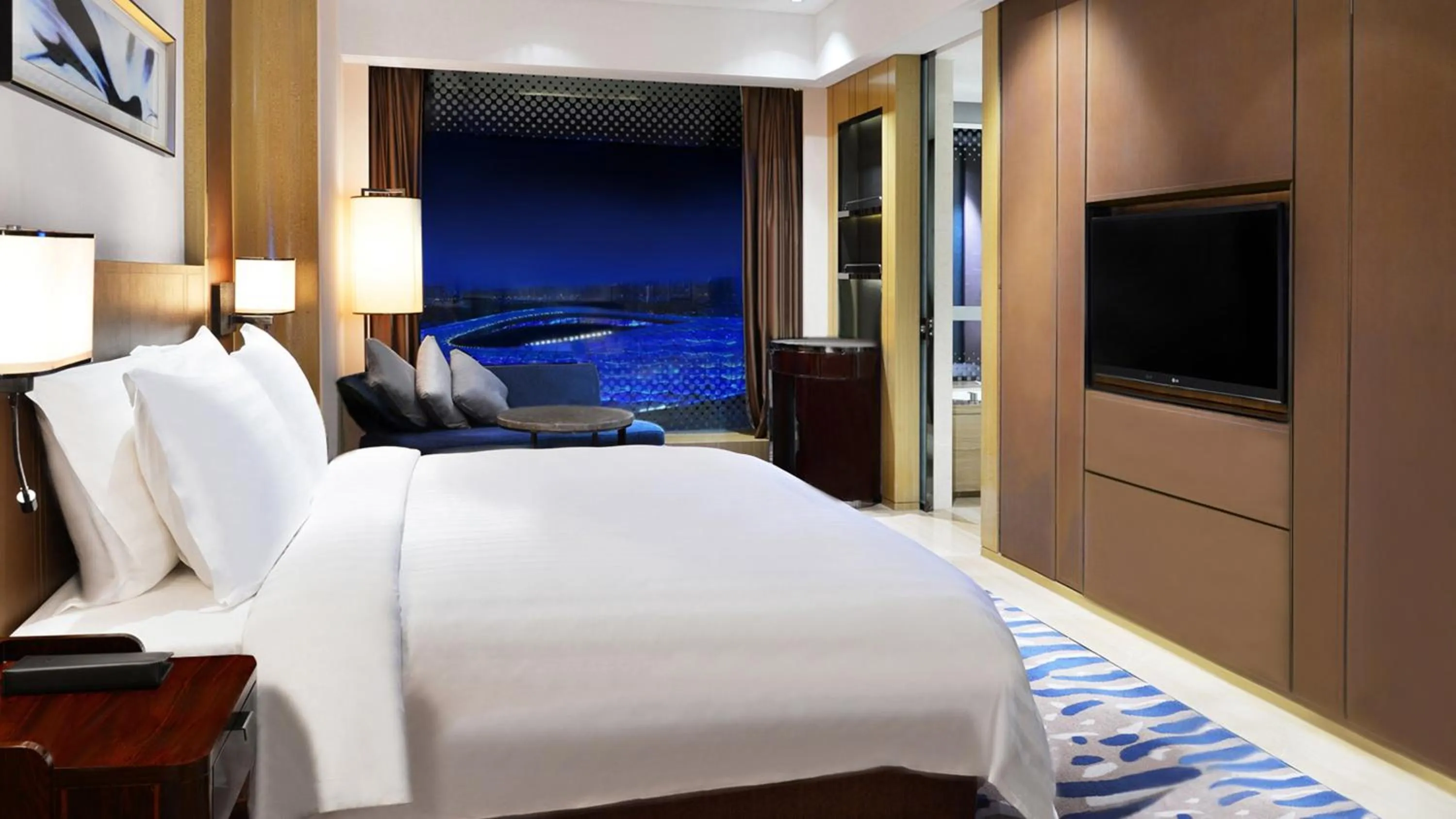 Photo of the whole room, Bed in Crowne Plaza Dalian Sports Center by IHG