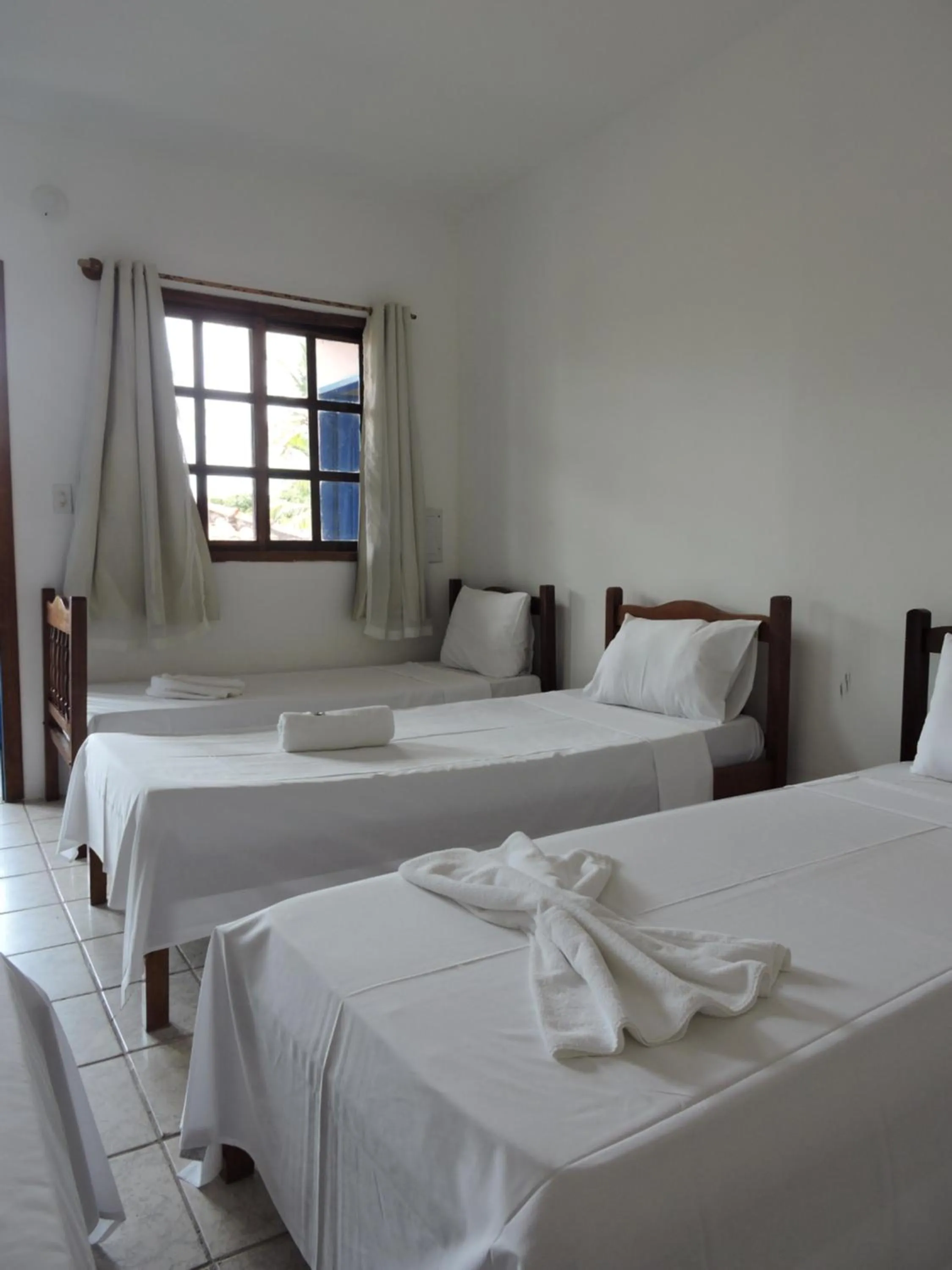 Bedroom, Bed in Morada dos Coqueiros Praia Hotel