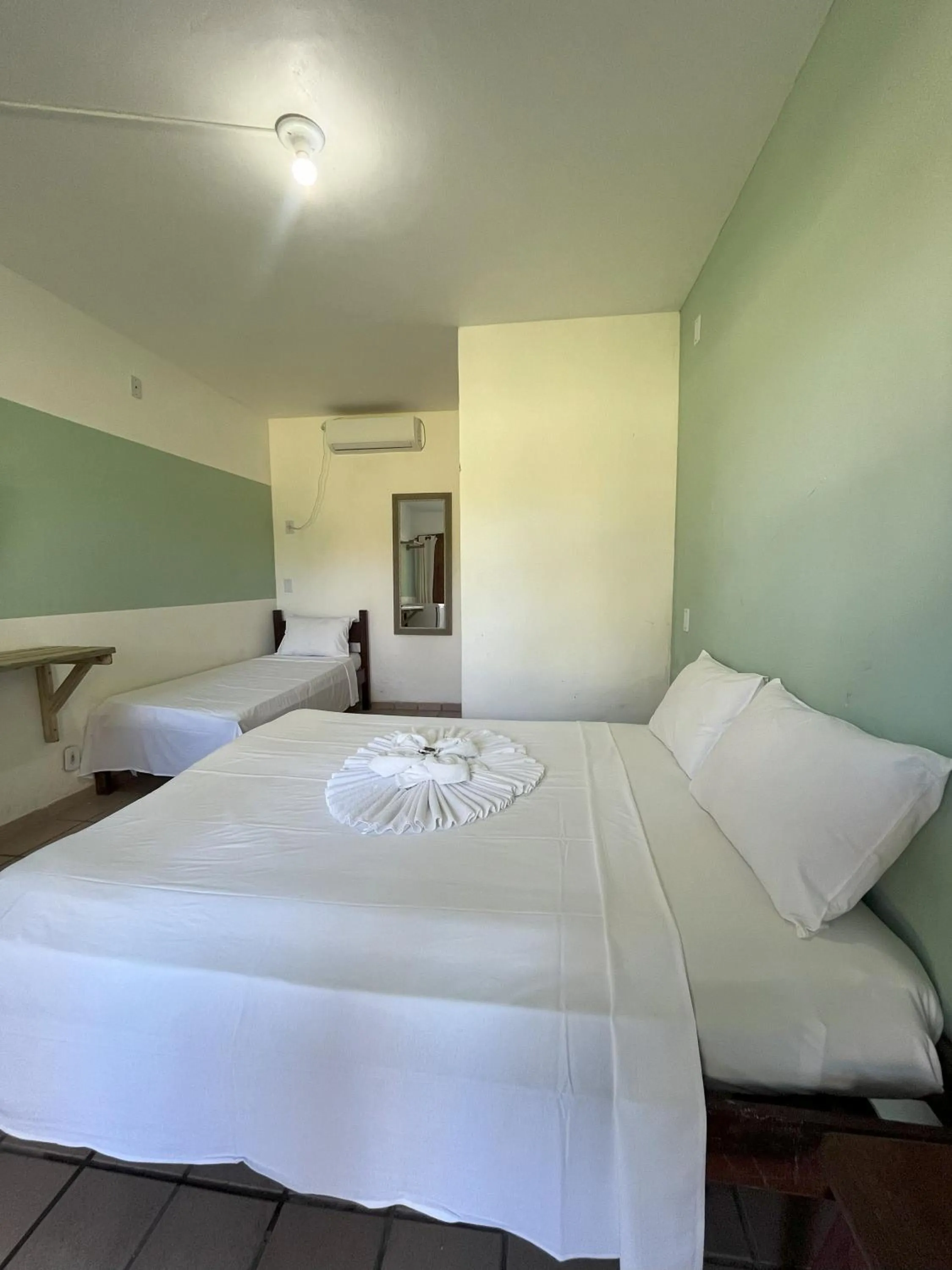 Bedroom, Bed in Morada dos Coqueiros Praia Hotel