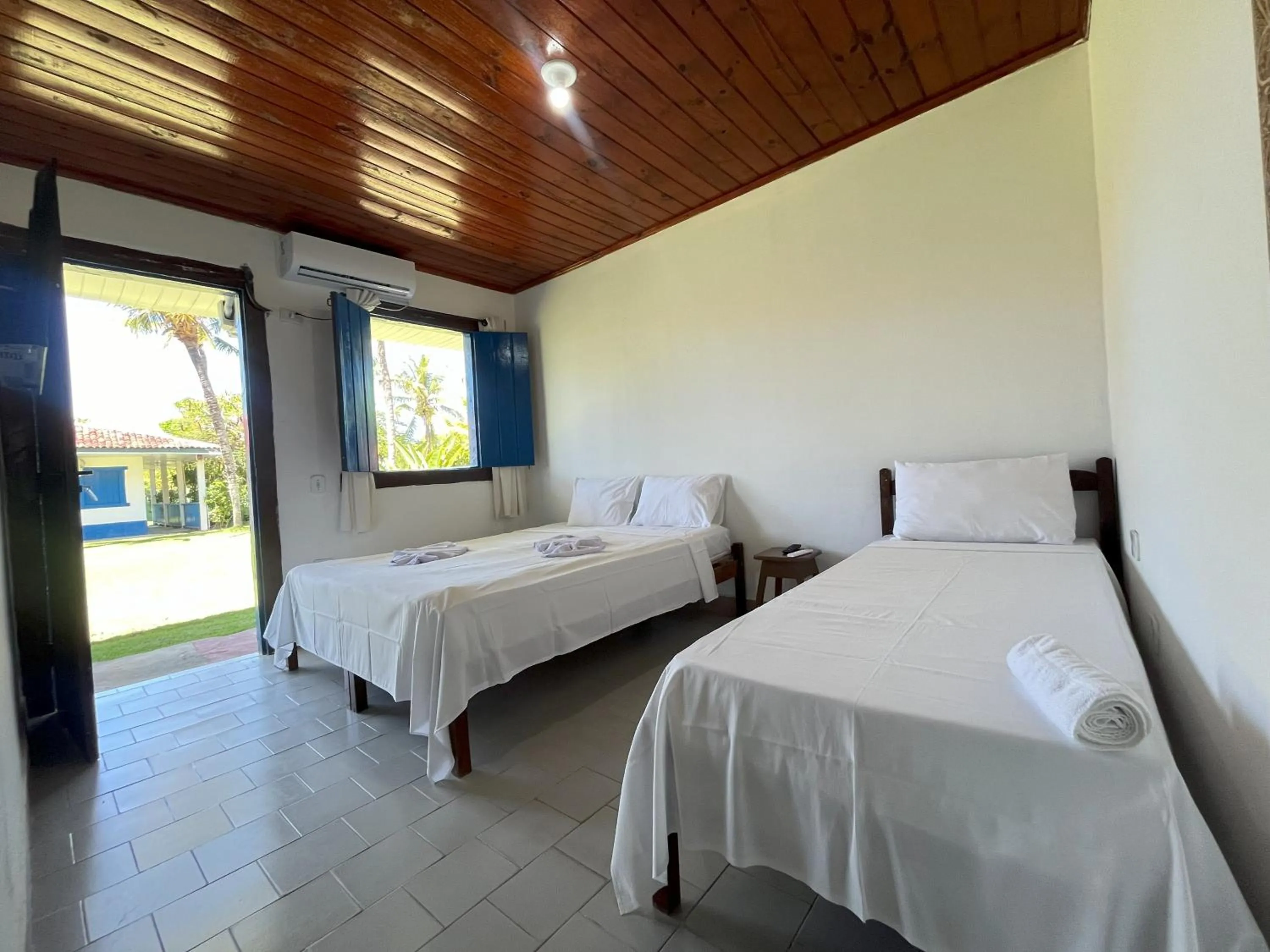 Bedroom, Bed in Morada dos Coqueiros Praia Hotel