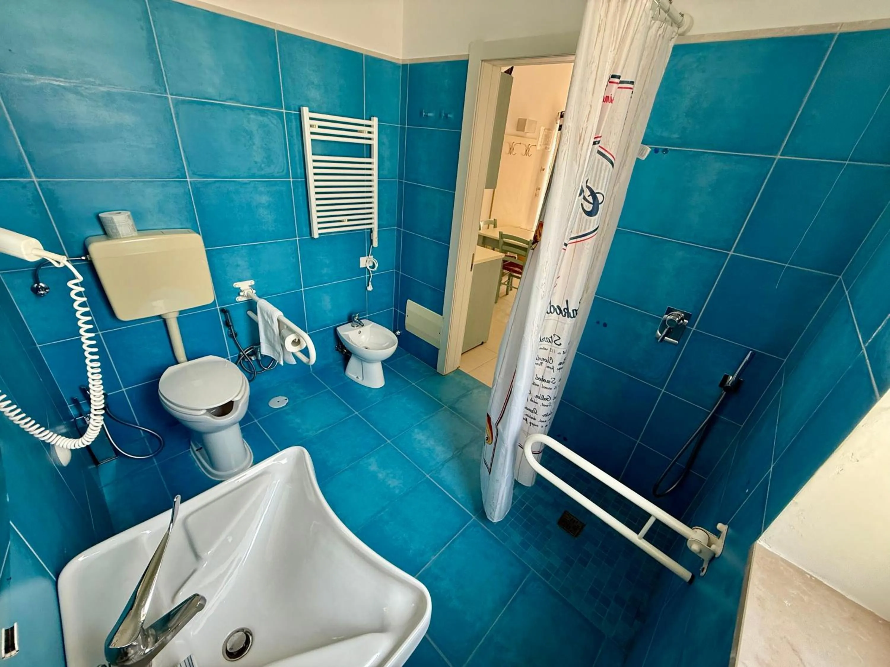 Bathroom in Baia Sangiorgio Hotel & Beach Club