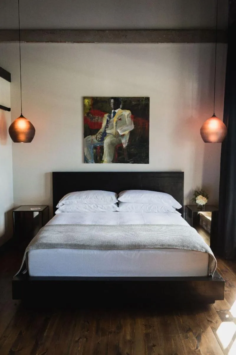 Bed in GunRunner Boutique Hotel